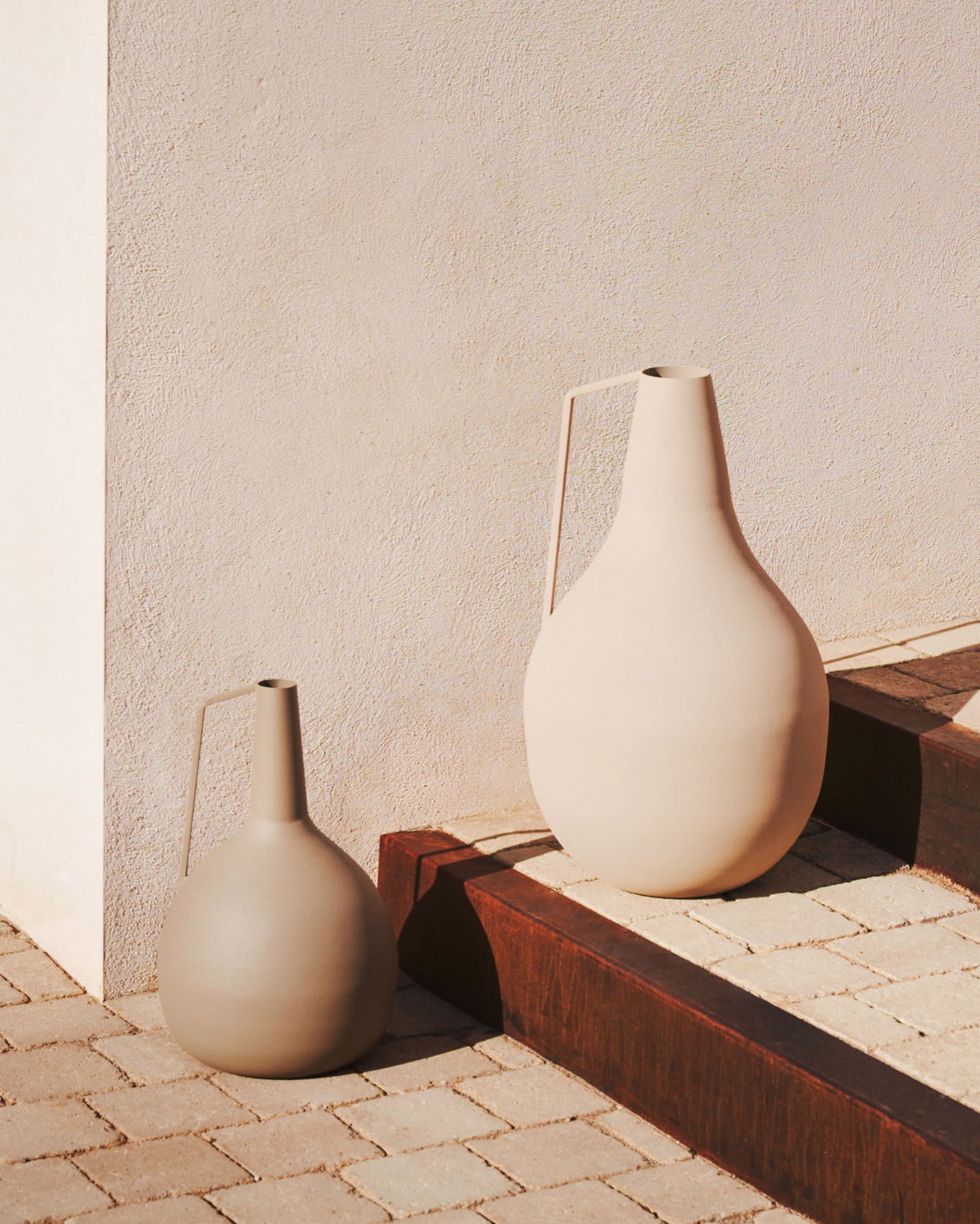 Geometric shapes in decor, solid wood pieces, and ceramic objects.