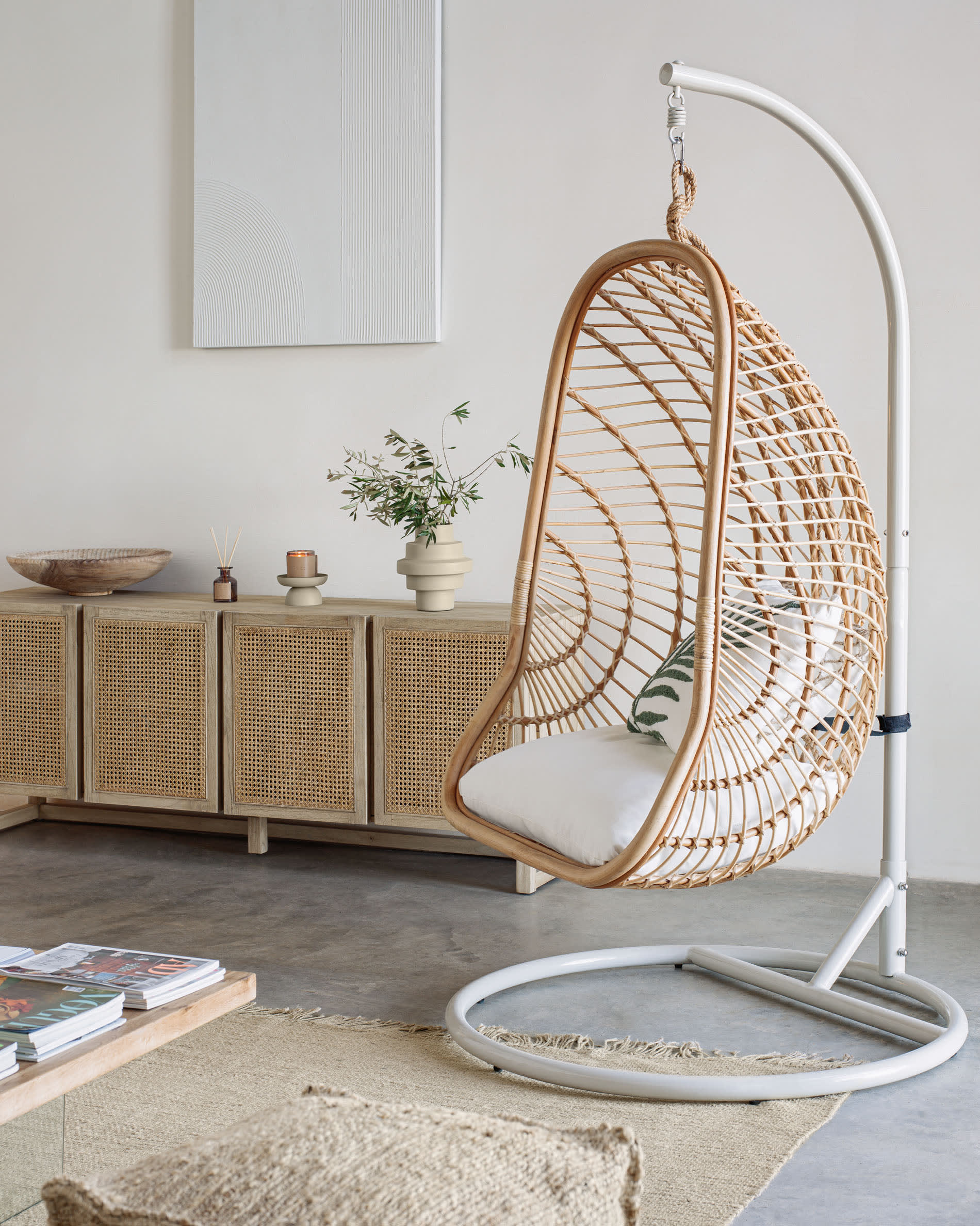 Ekaterina dark grey hanging armchair with foot in rattan