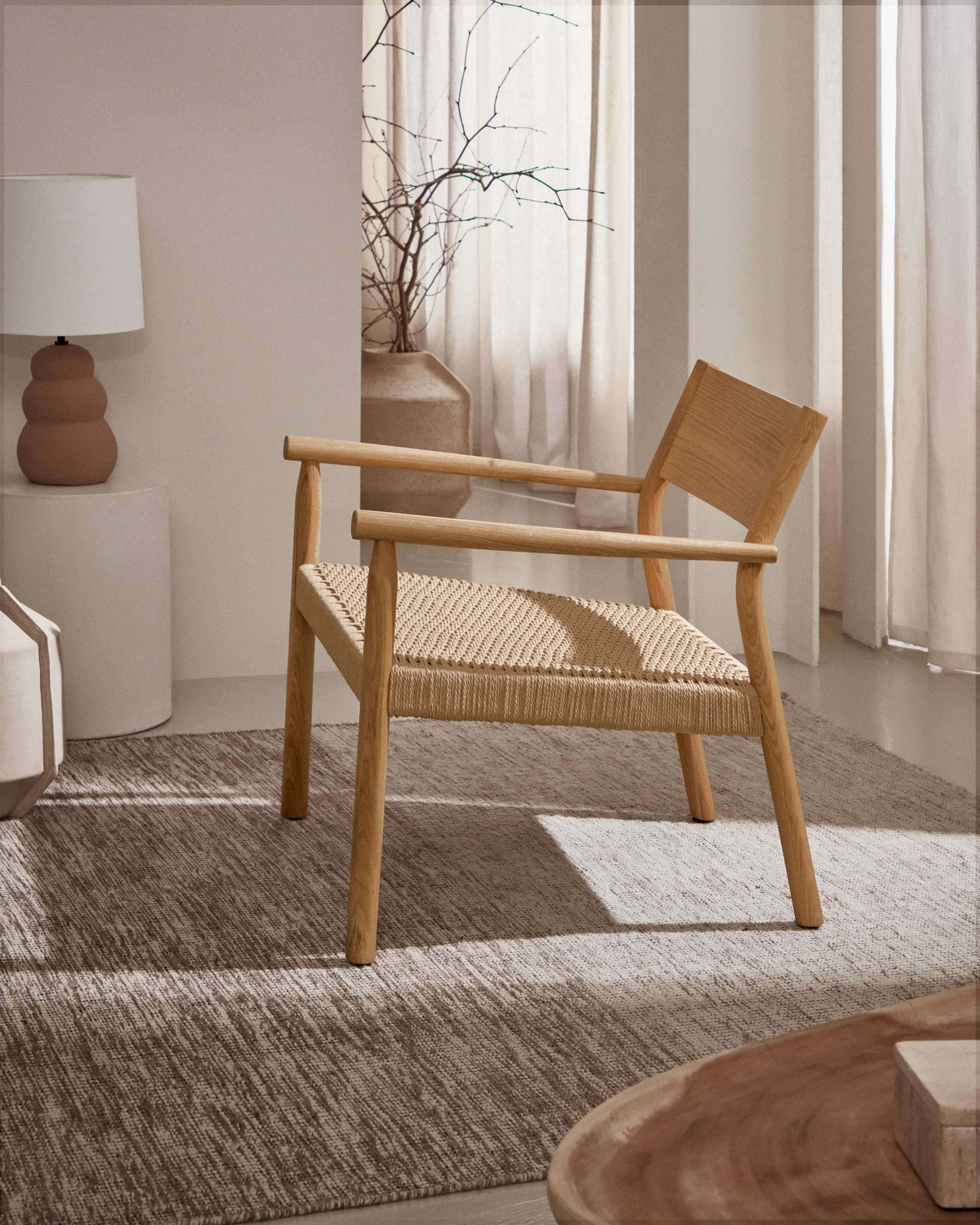 Yalia armchair in solid oak wood with natural finish and paper rope seat FSC Mix Credit