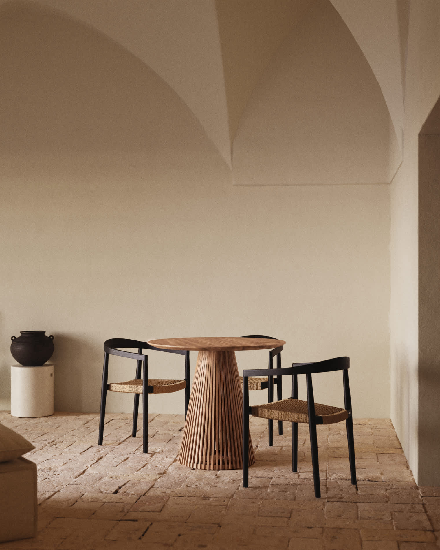Ydalia stackable outdoor chair in solid teak wood with black finish and synthetic rattan rope