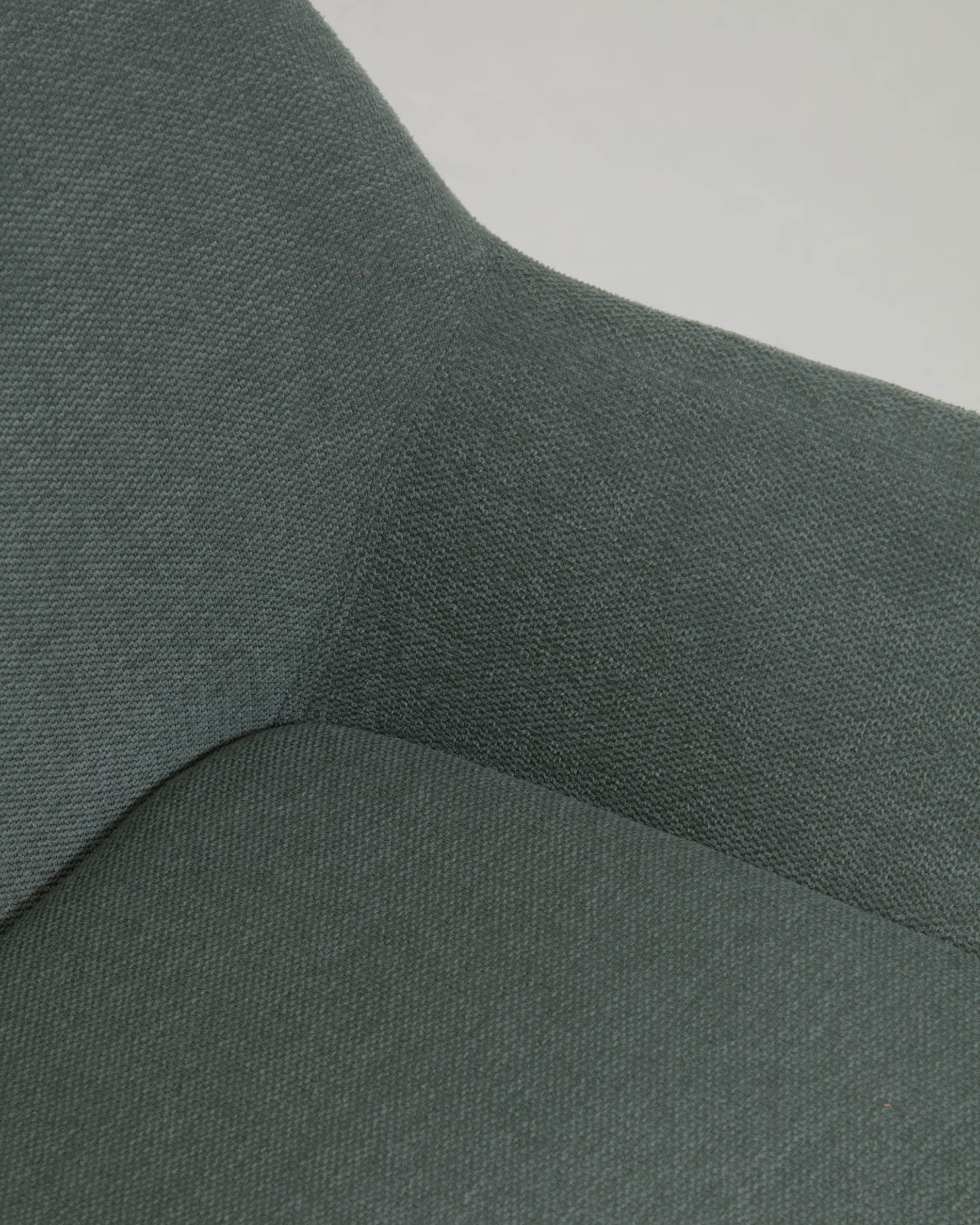 Konna chair in green with solid ash wood legs in a dark finish FR