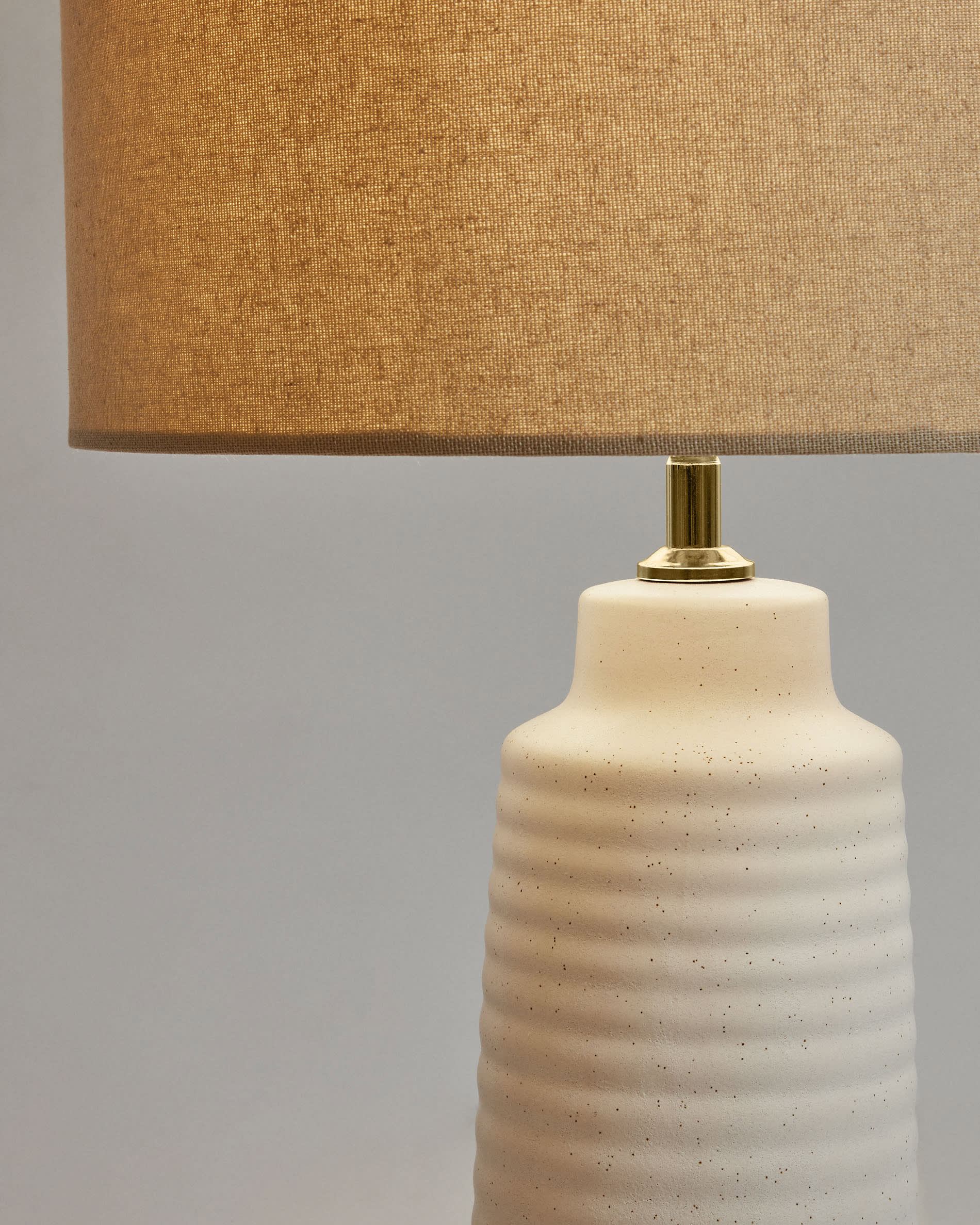 Mijal ceramic table lamp with a white finish
