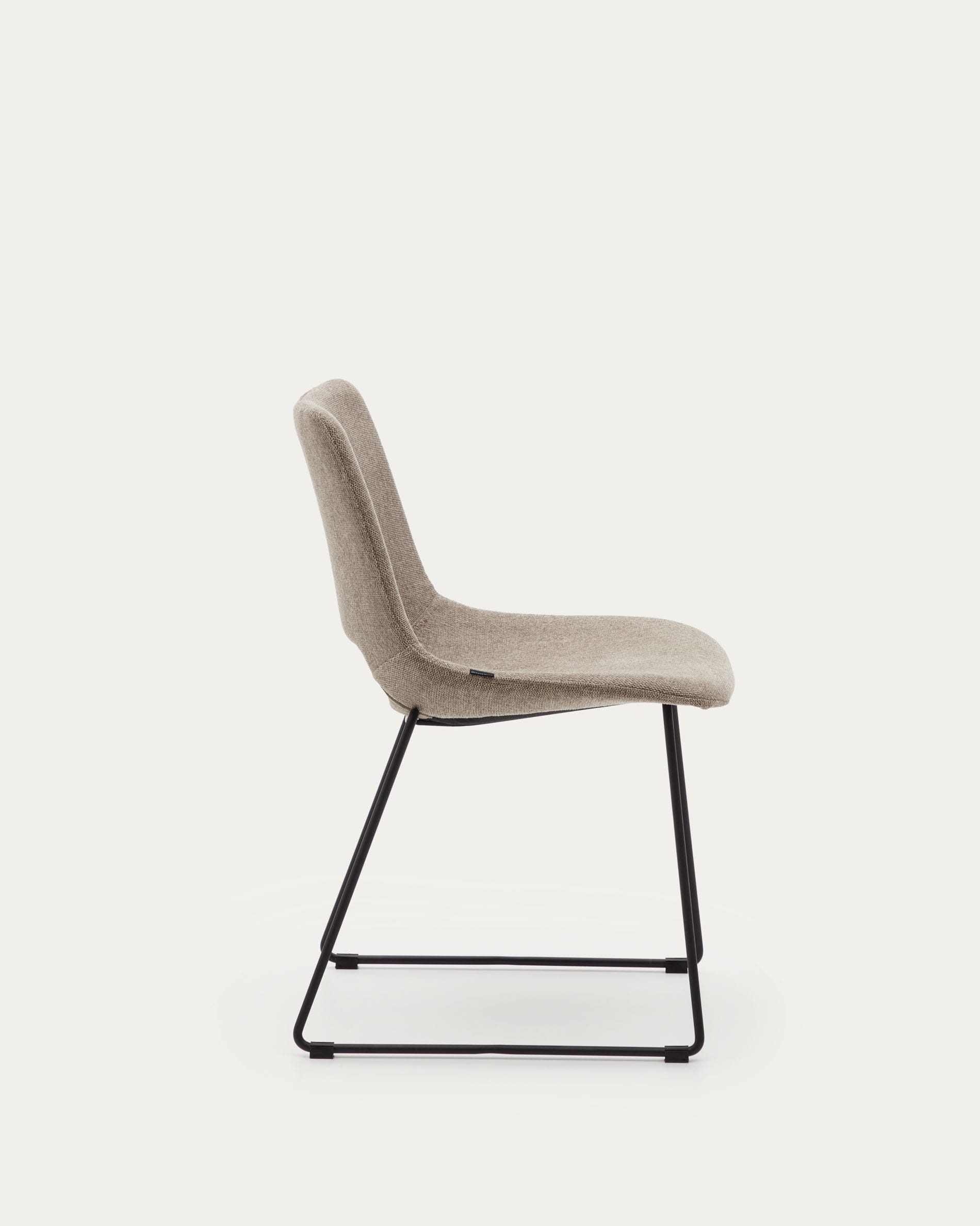 Zahara chair in brown with steel legs in a black finish