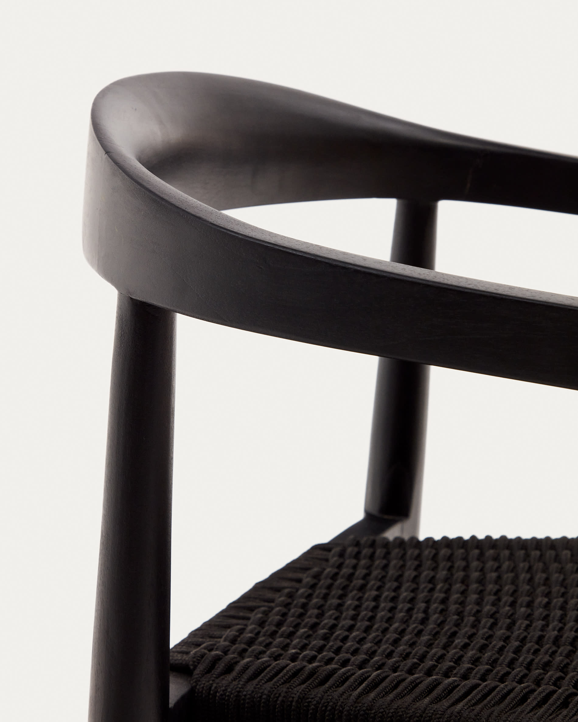 Ydalia stackable outdoor chair in solid teak wood with black finish and black rope