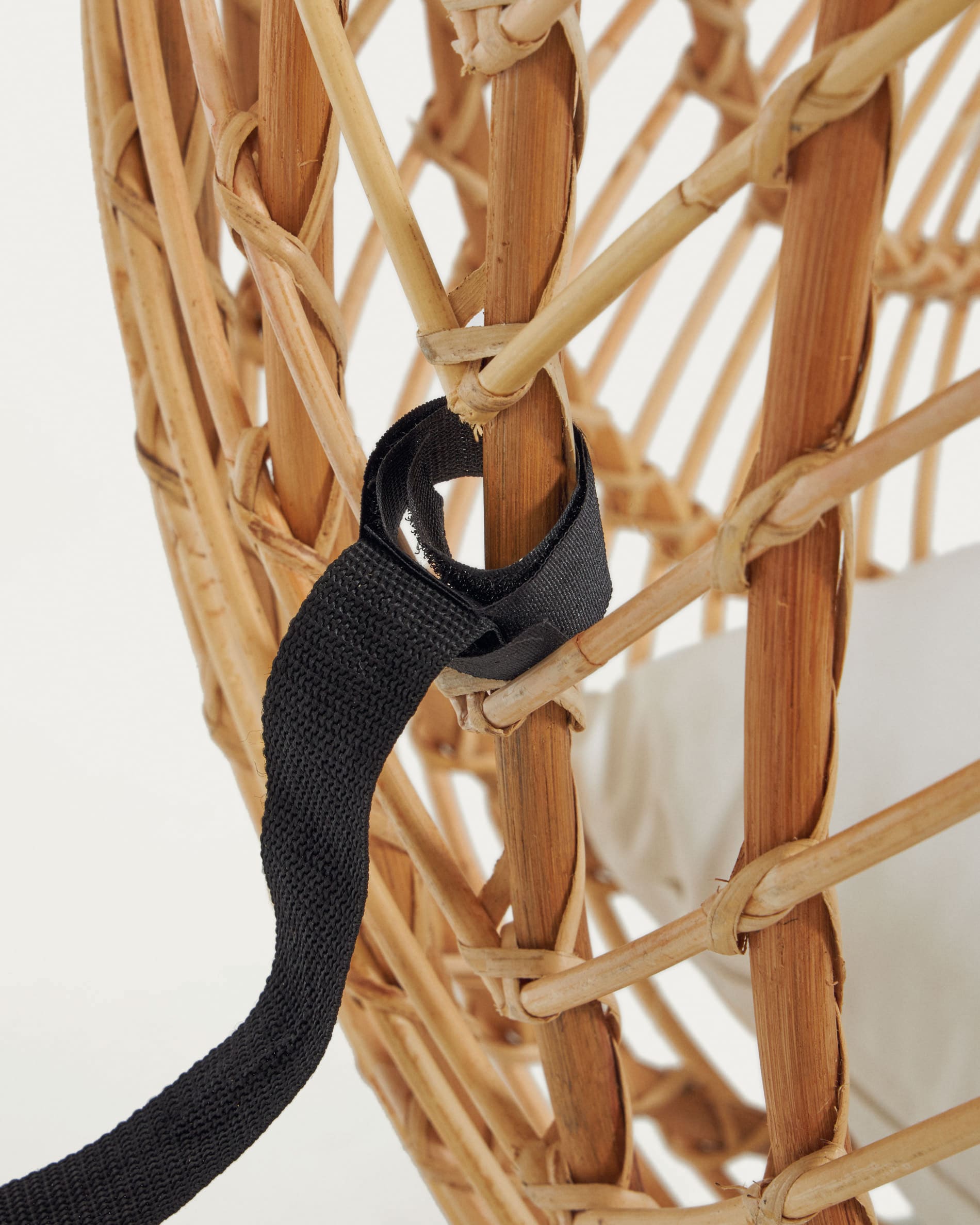 Ekaterina dark grey hanging armchair with foot in rattan