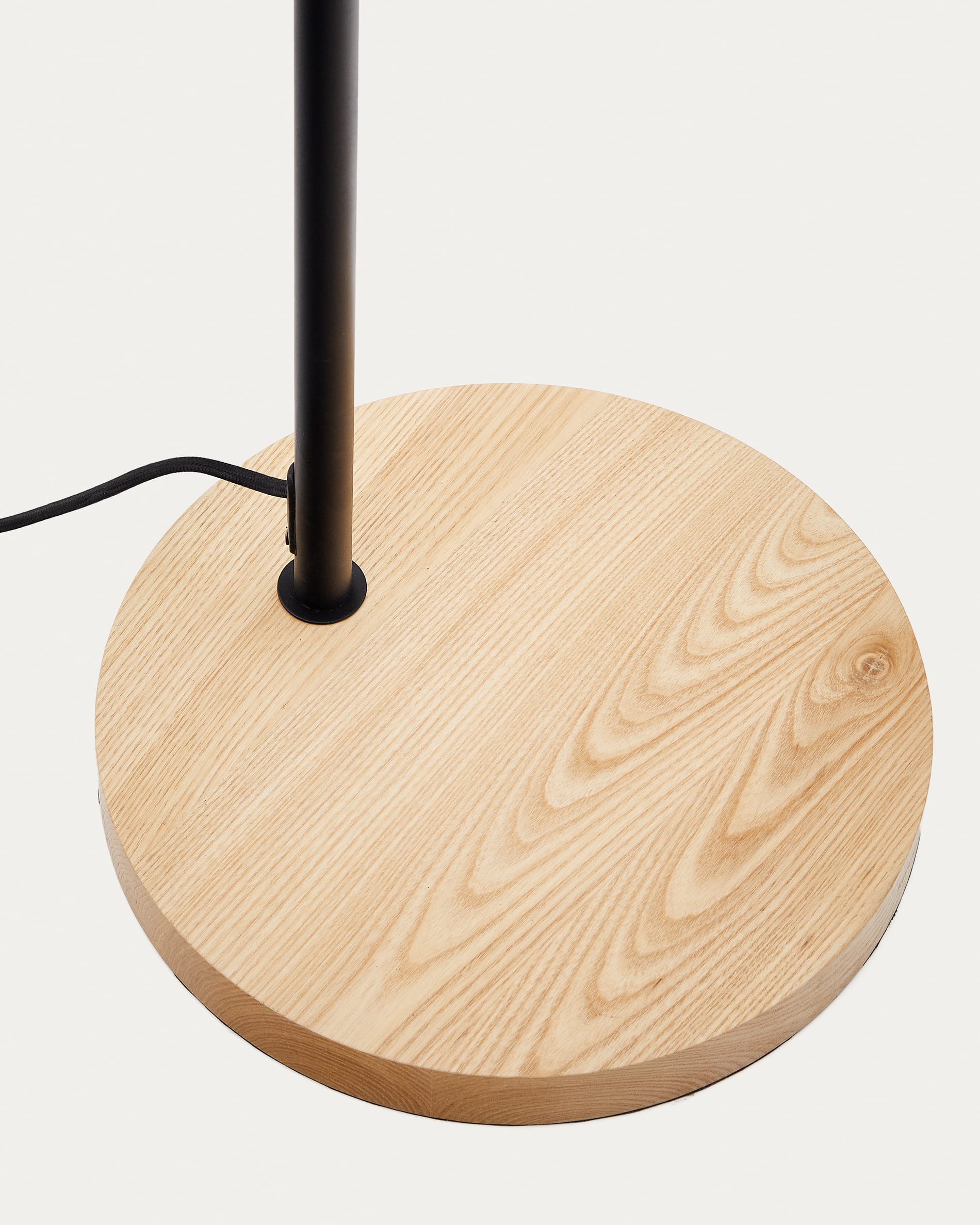 Catlar ash wood and metal floor lamp in a black painted finish