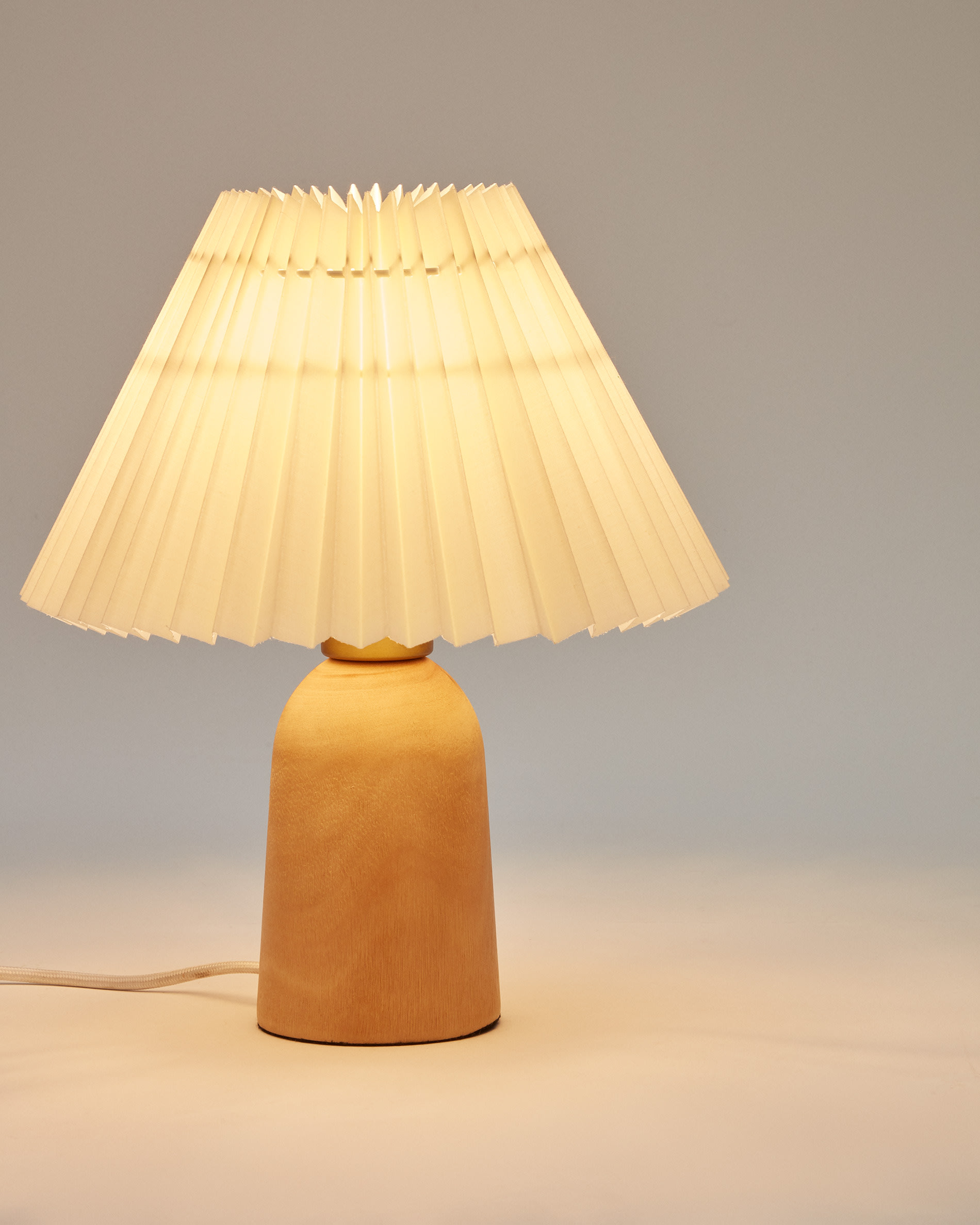 Benicarlo table lamp in wood with a natural, beige finish