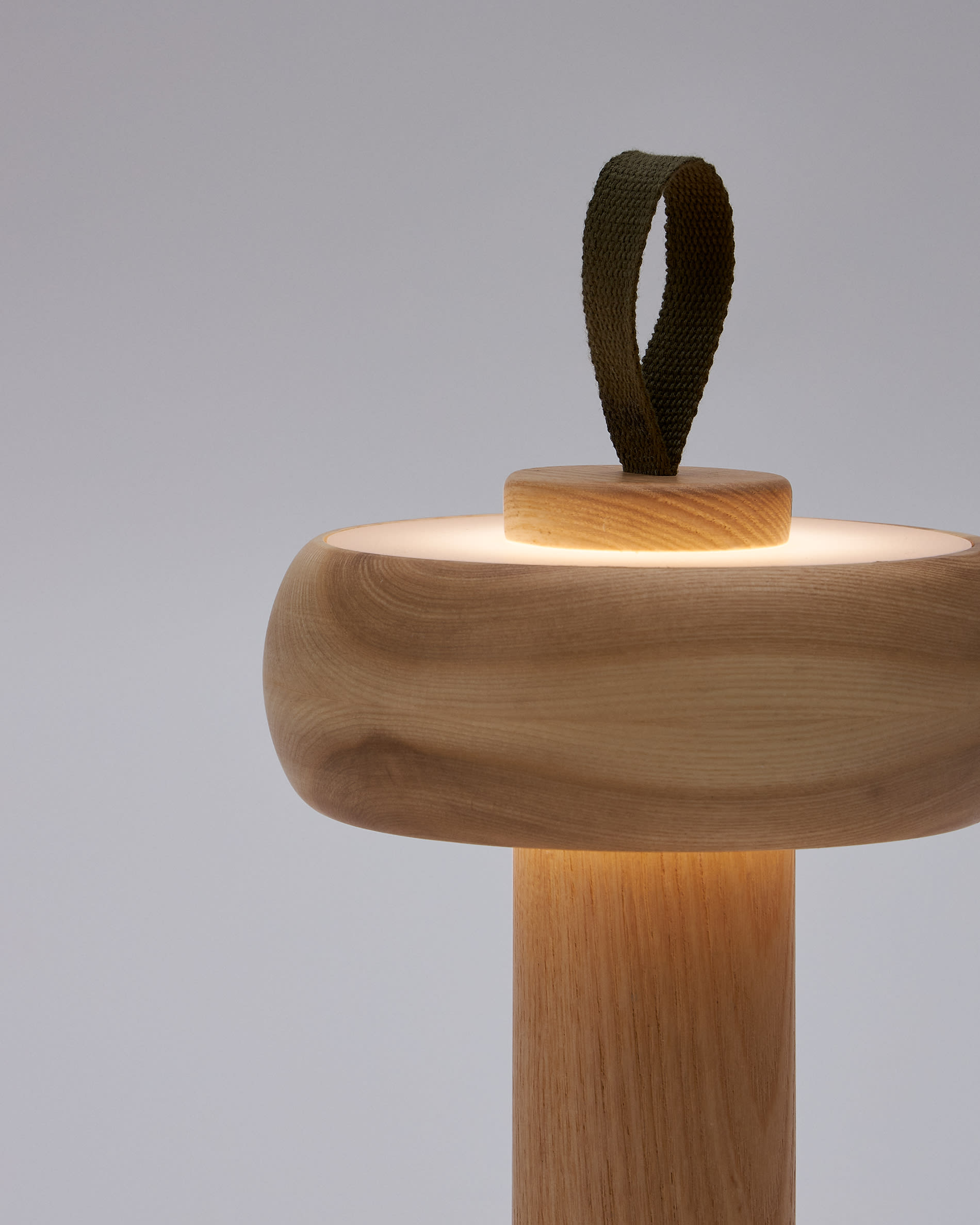 Luba solid ash portable table lamp with green cotton handle