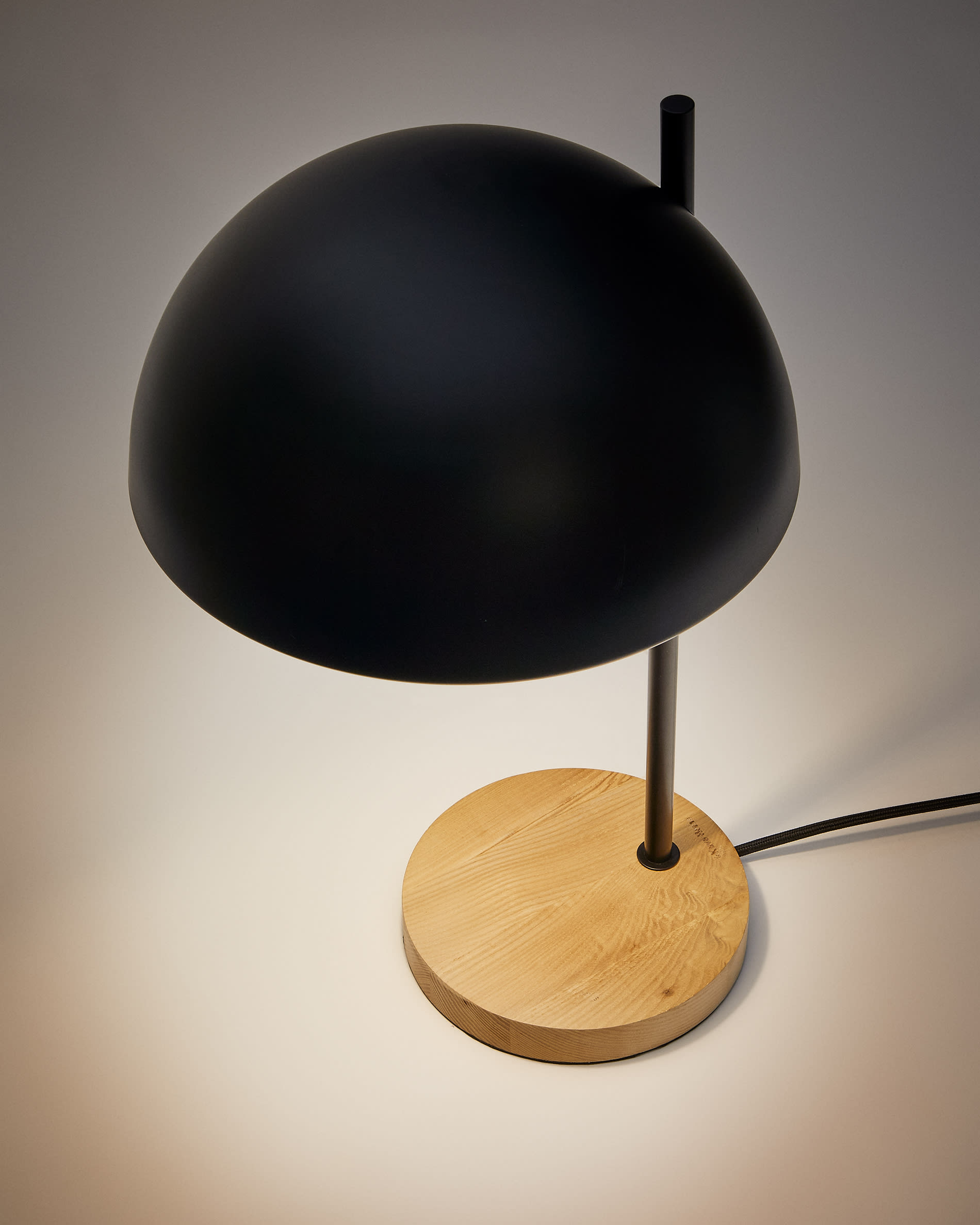 Catlar ash wood and metal table lamp in a black painted finish