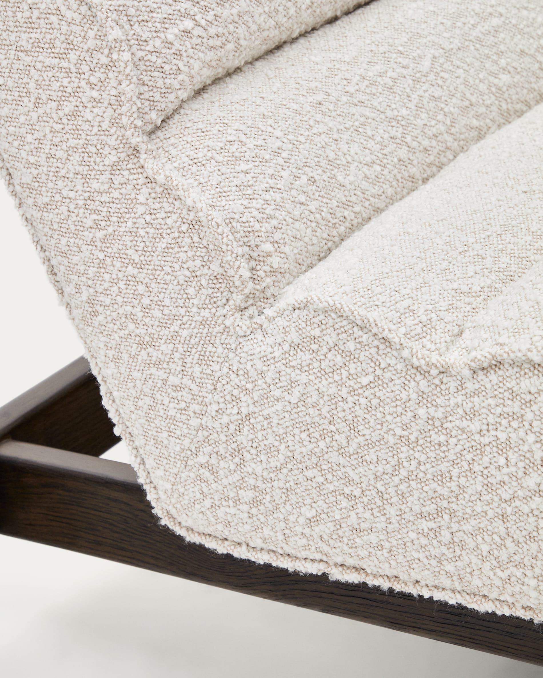 Magira armchair in white bouclé and solid oak wood with a dark finish