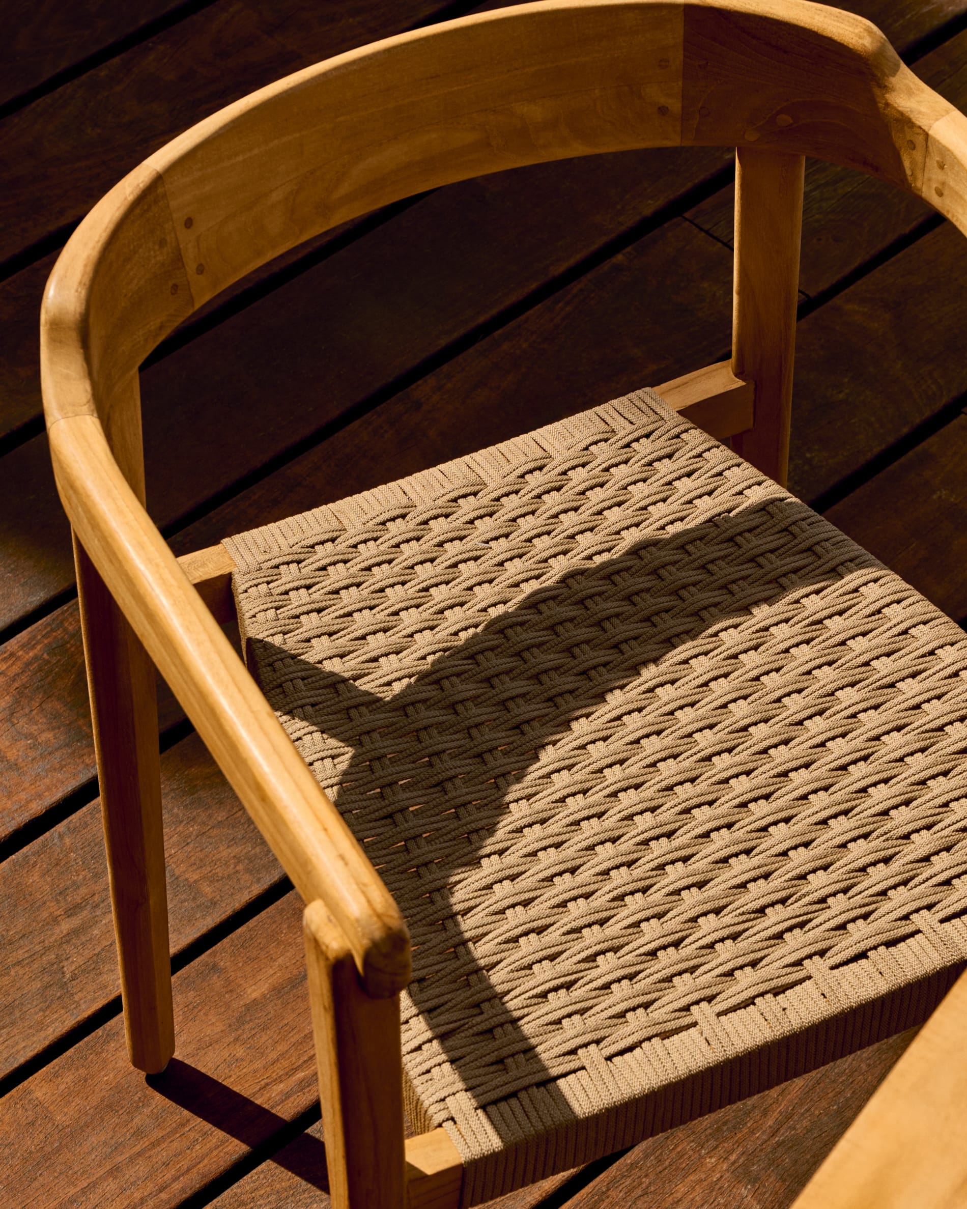 Icaro stackable chair in FSC 100% solid teak wood with natural finish and beige rope cord