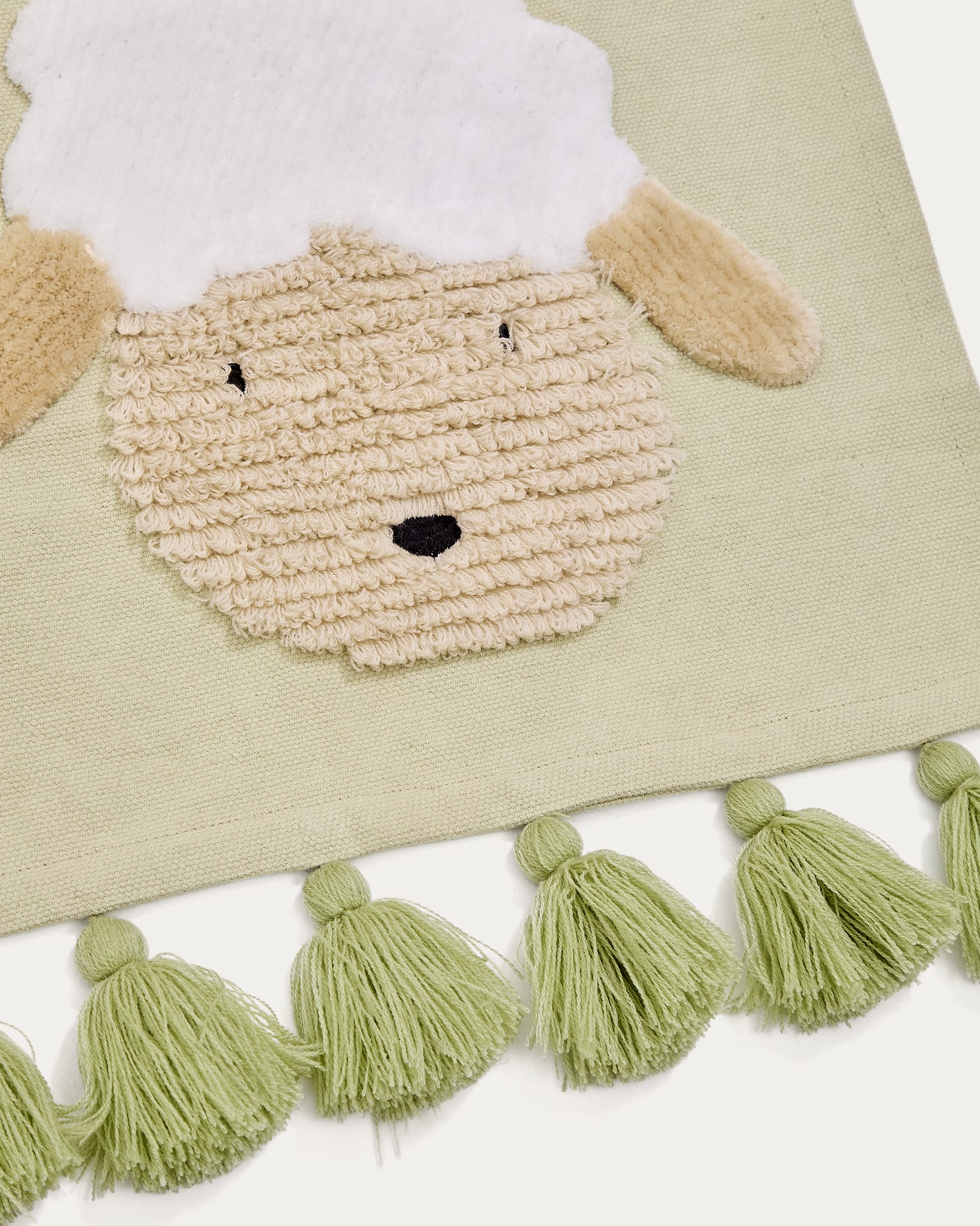 Milu wall tapestry in green cotton with a sheep and green tassels