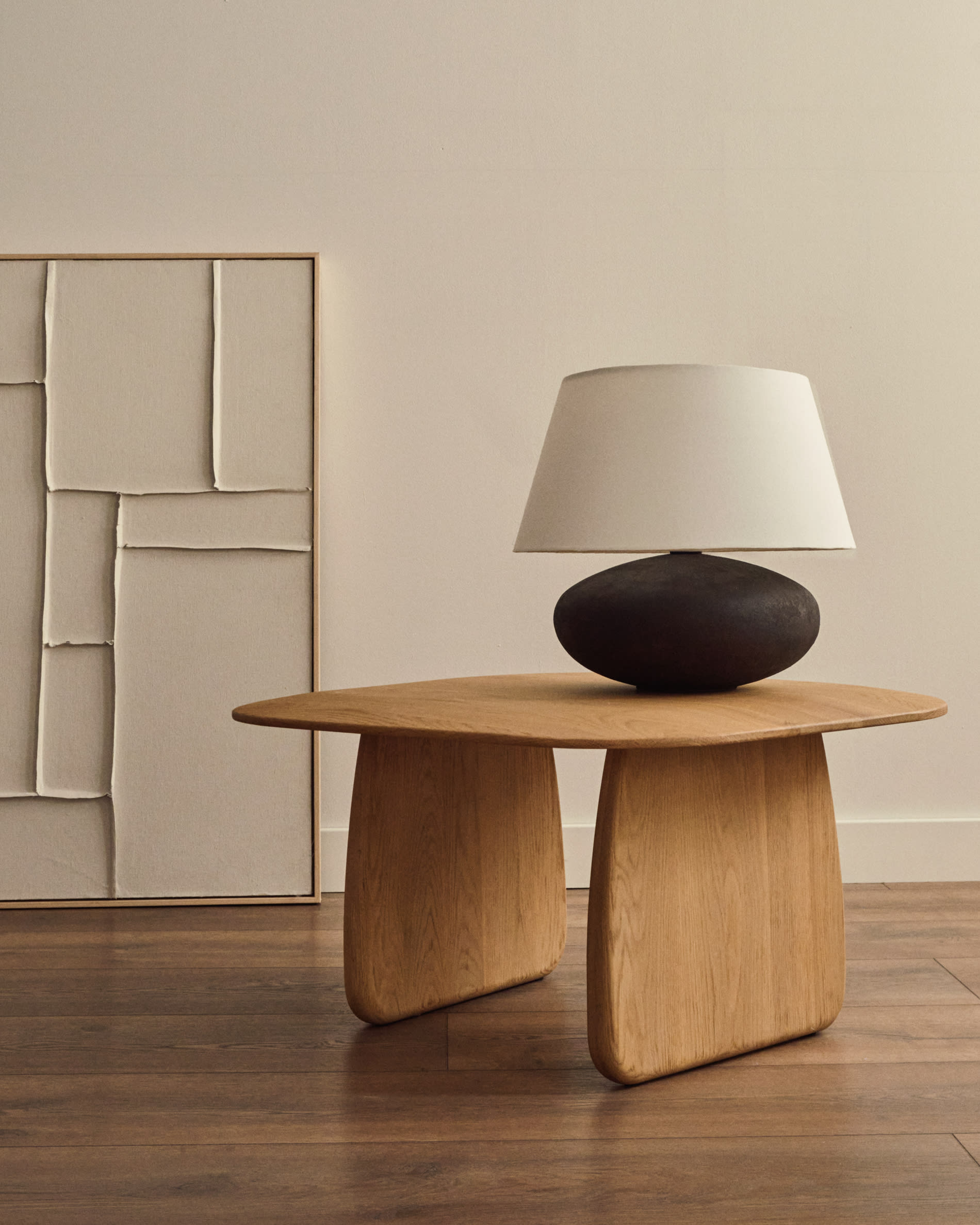 Nessi metal table lamp in a black terracotta effect finish