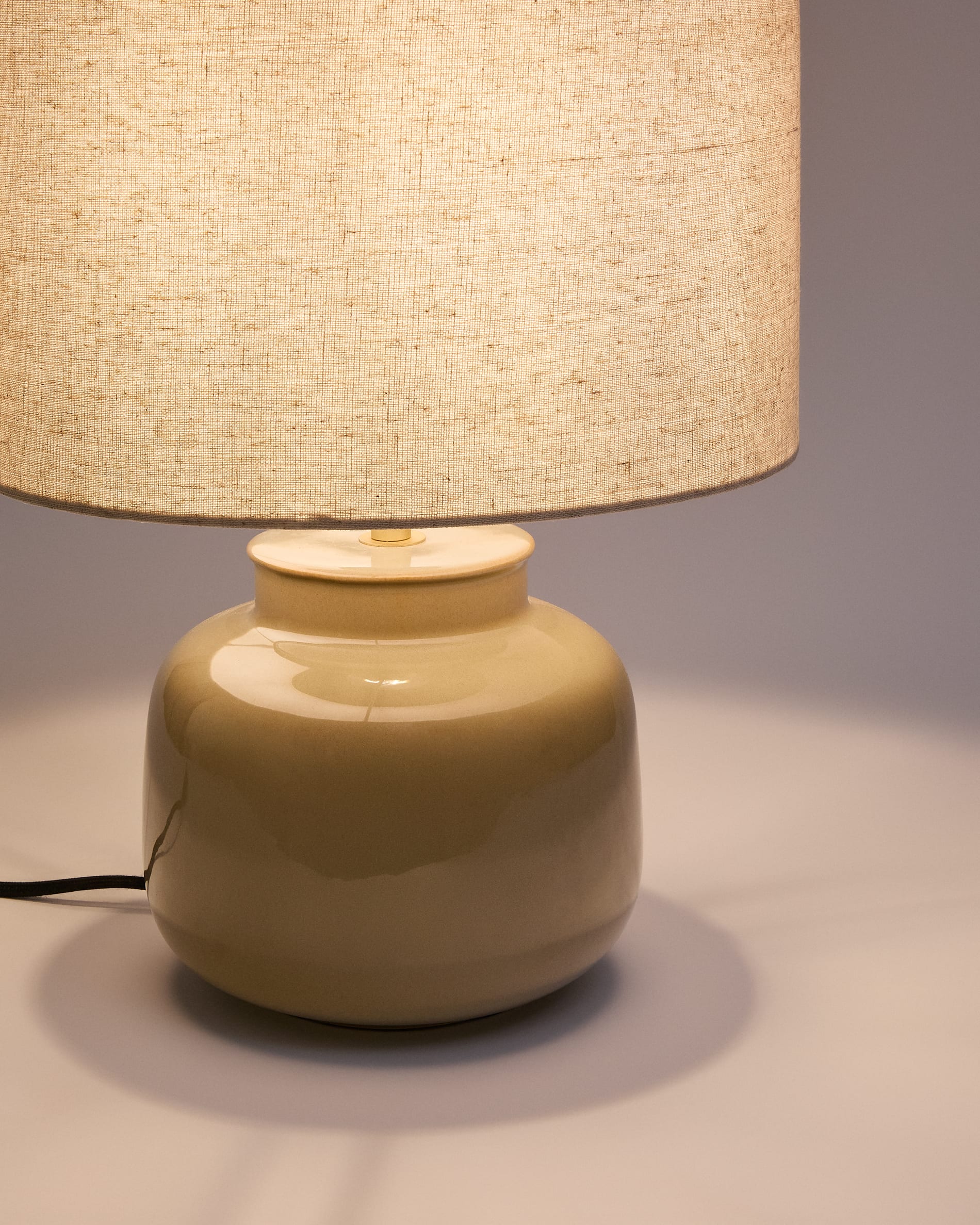 Tay green ceramic and beige linen table lamp