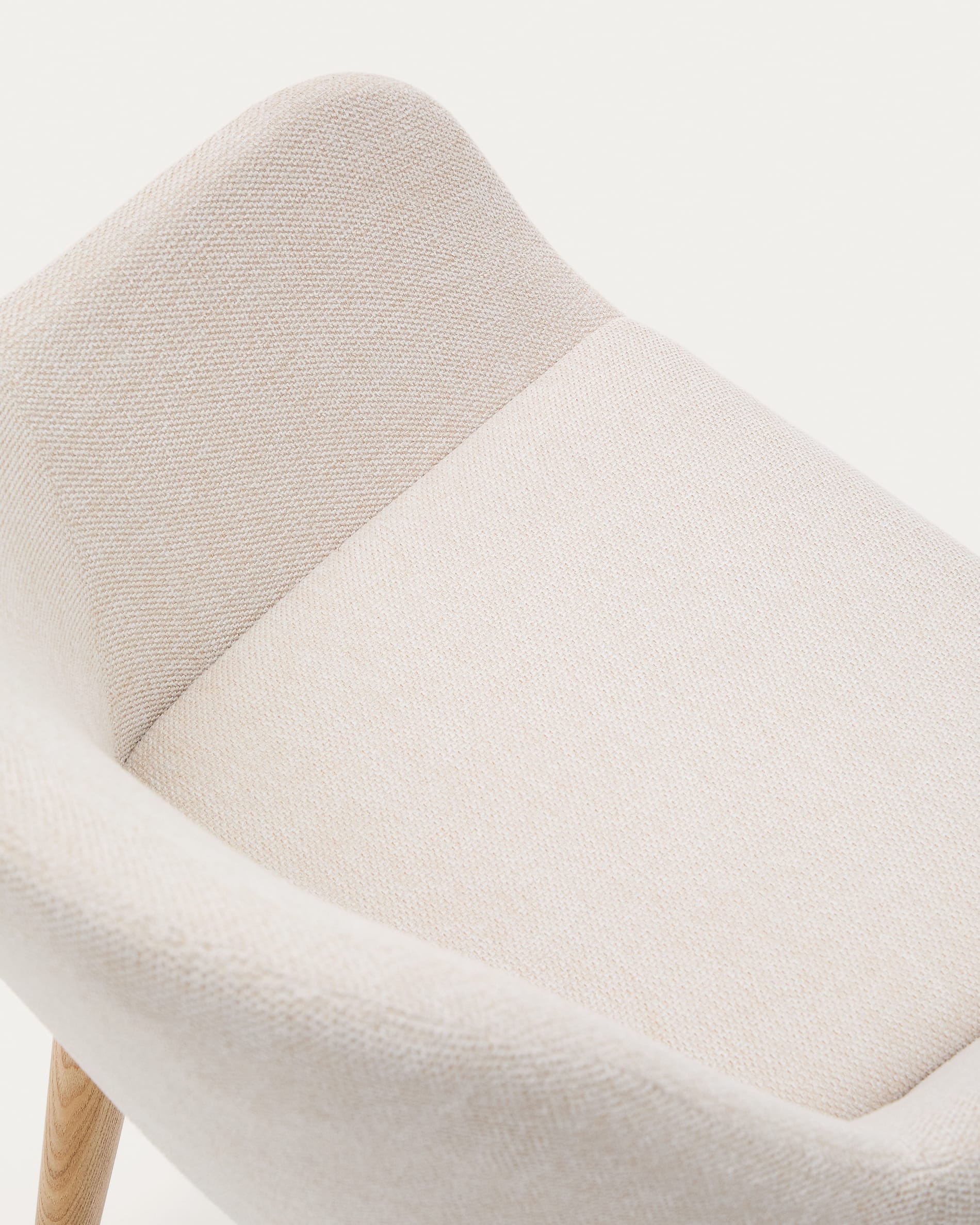 Konna chair in beige with solid ash wood legs in a natural finish
