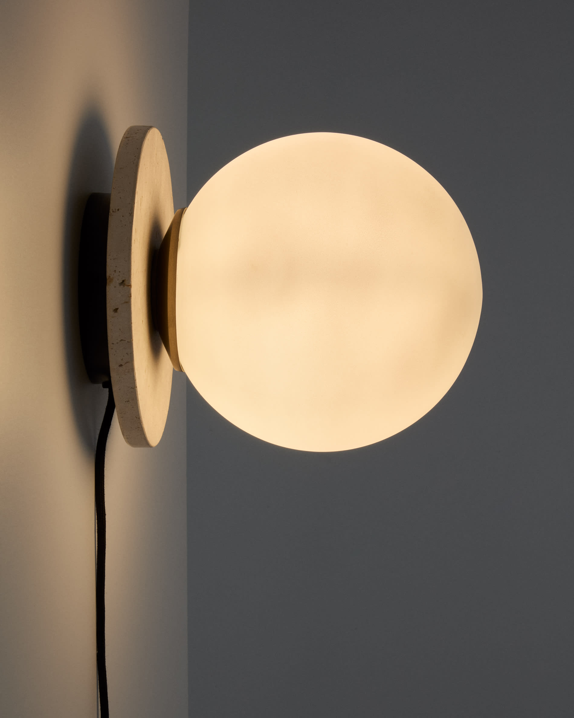 Malachi glass and travertine stone wall lamp