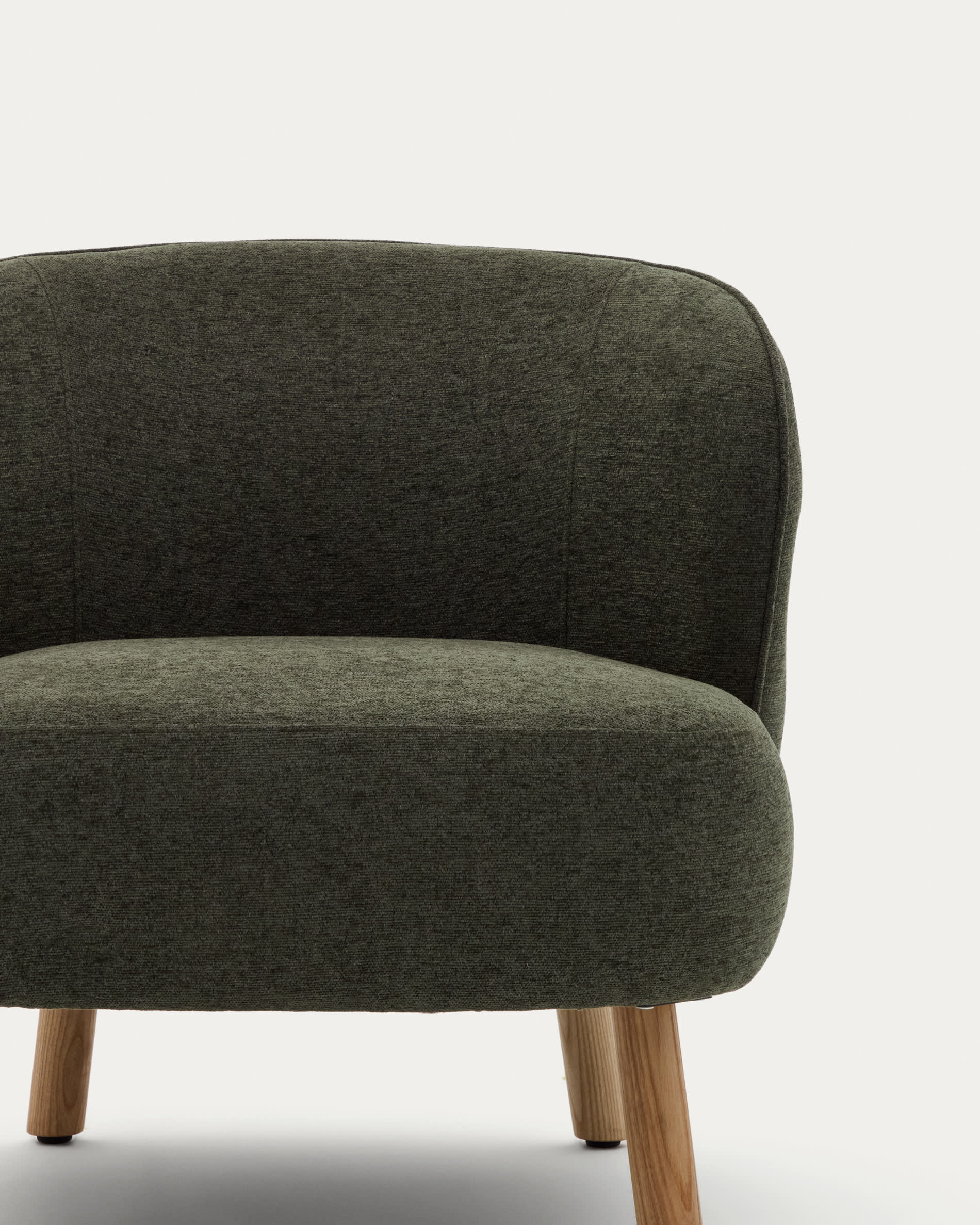 Ulit armchair in green chenille with solid ash wood legs in a natural finish