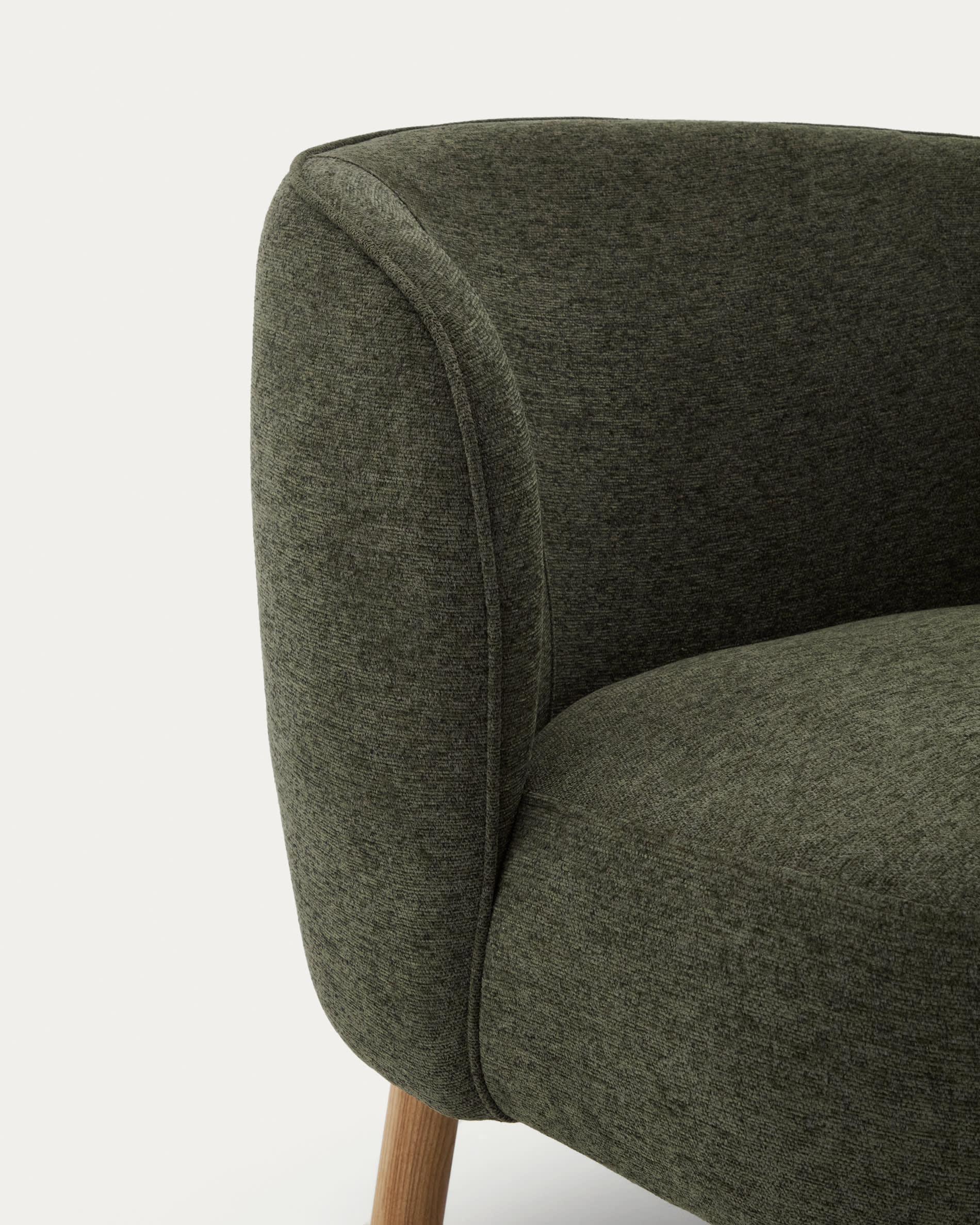 Ulit armchair in green chenille with solid ash wood legs in a natural finish