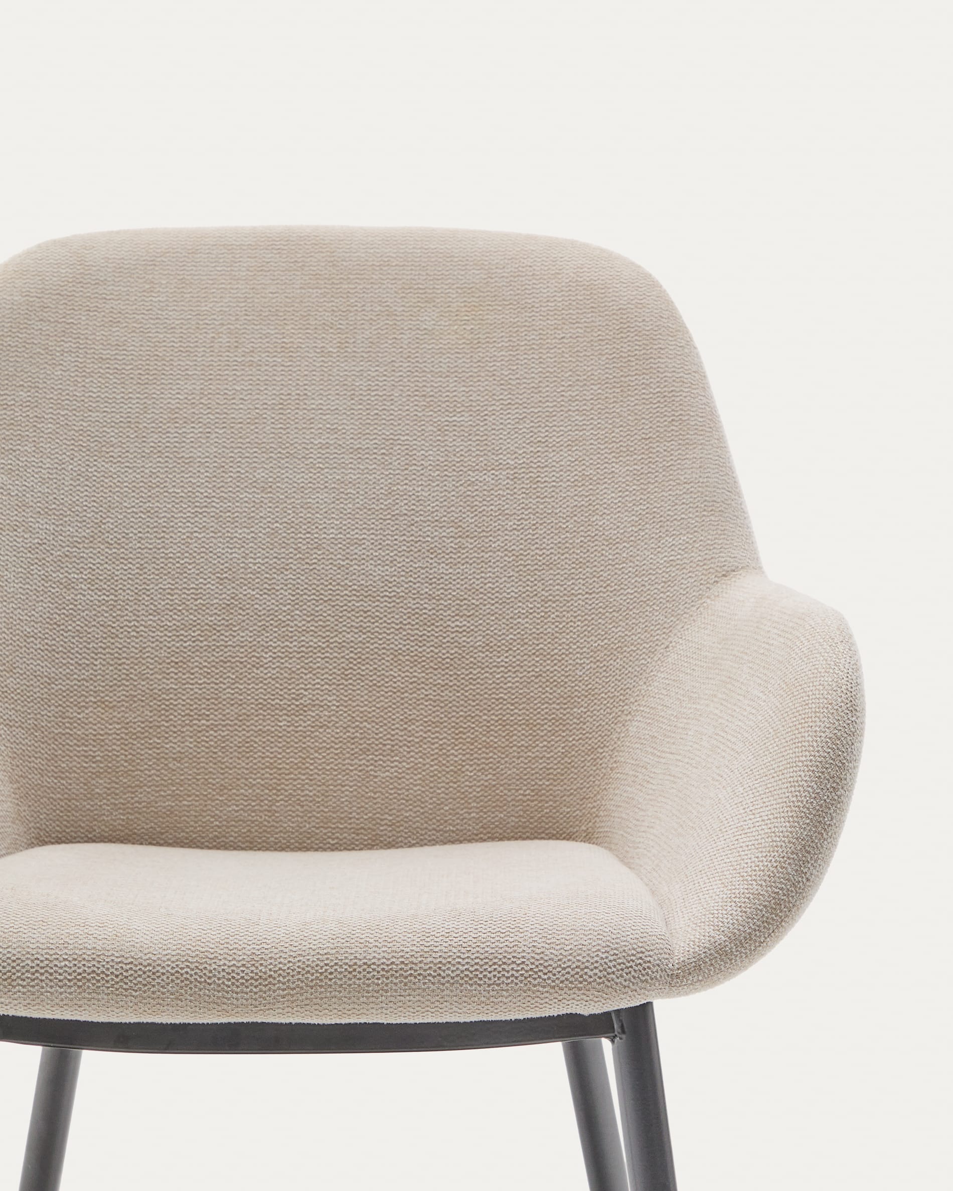 Konna chair in beige and steel legs in a painted black finish