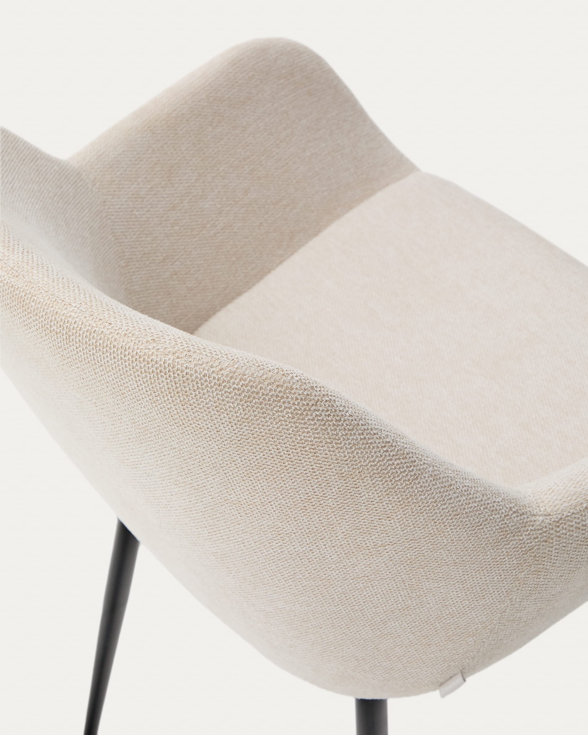 Konna chair in beige and steel legs in a painted black finish