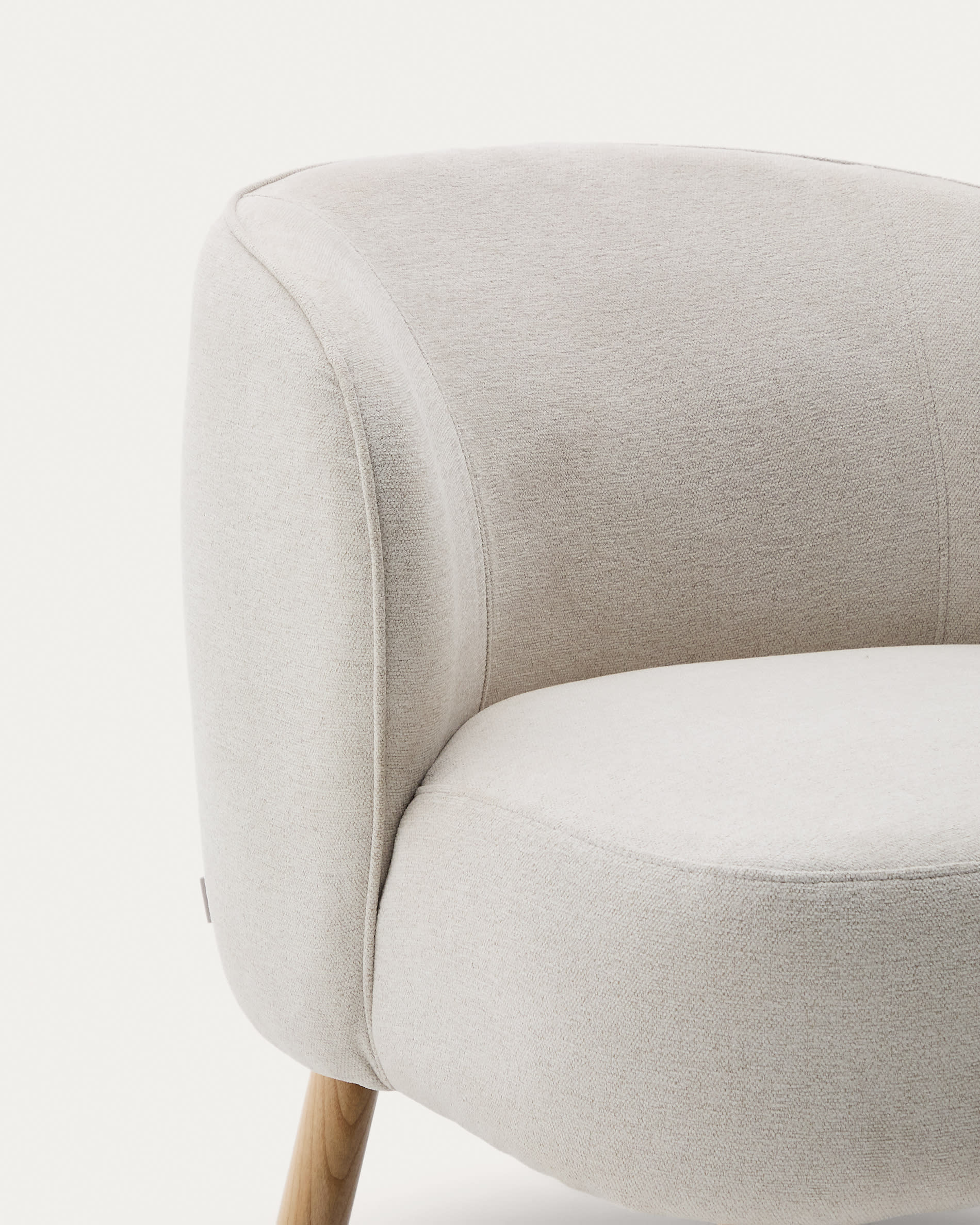 Ulit armchair in beige chenille with solid ash wood legs in a natural finish
