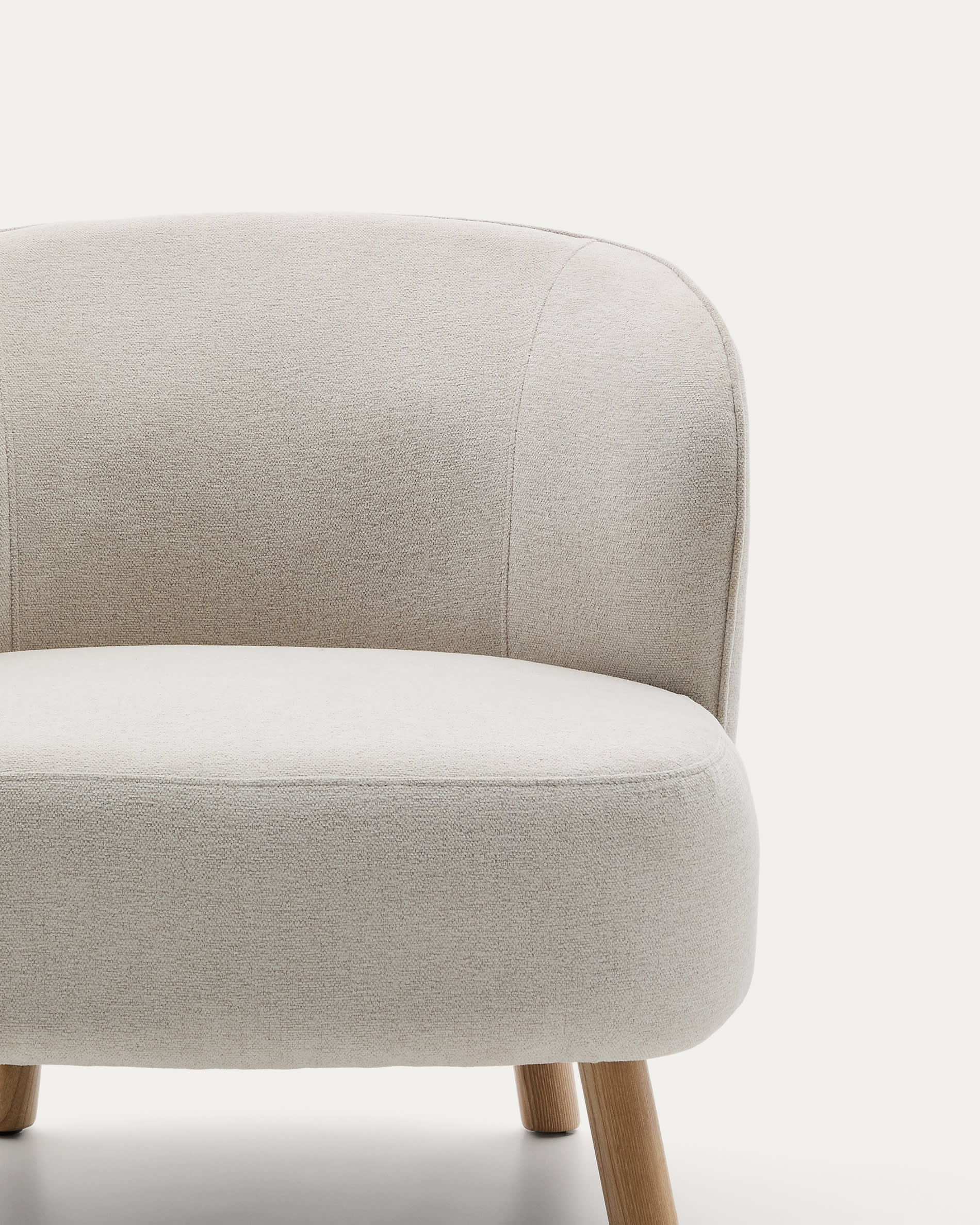 Ulit armchair in beige chenille with solid ash wood legs in a natural finish