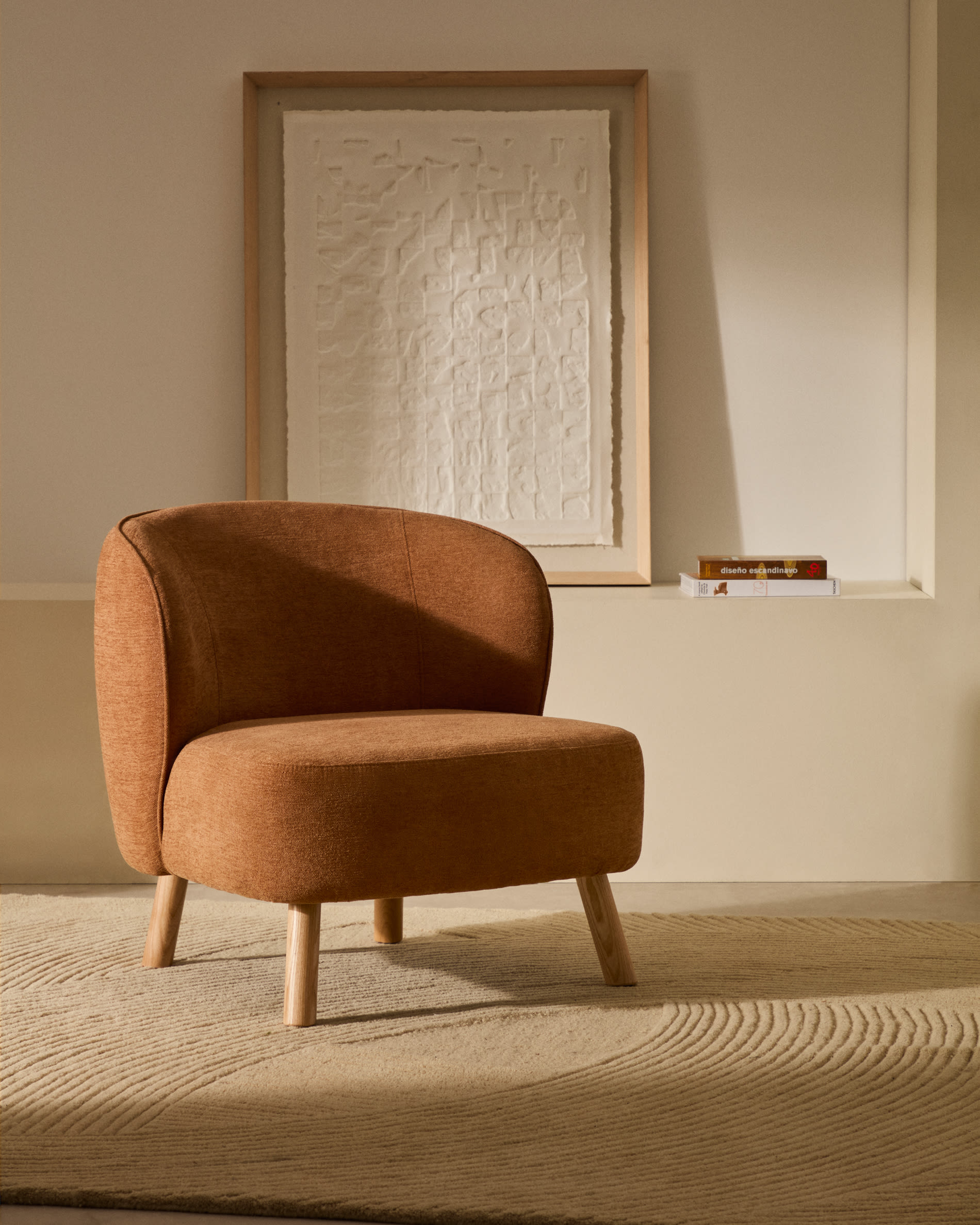 Ulit armchair in terracotta chenille with solid ash wood legs in a natural finish