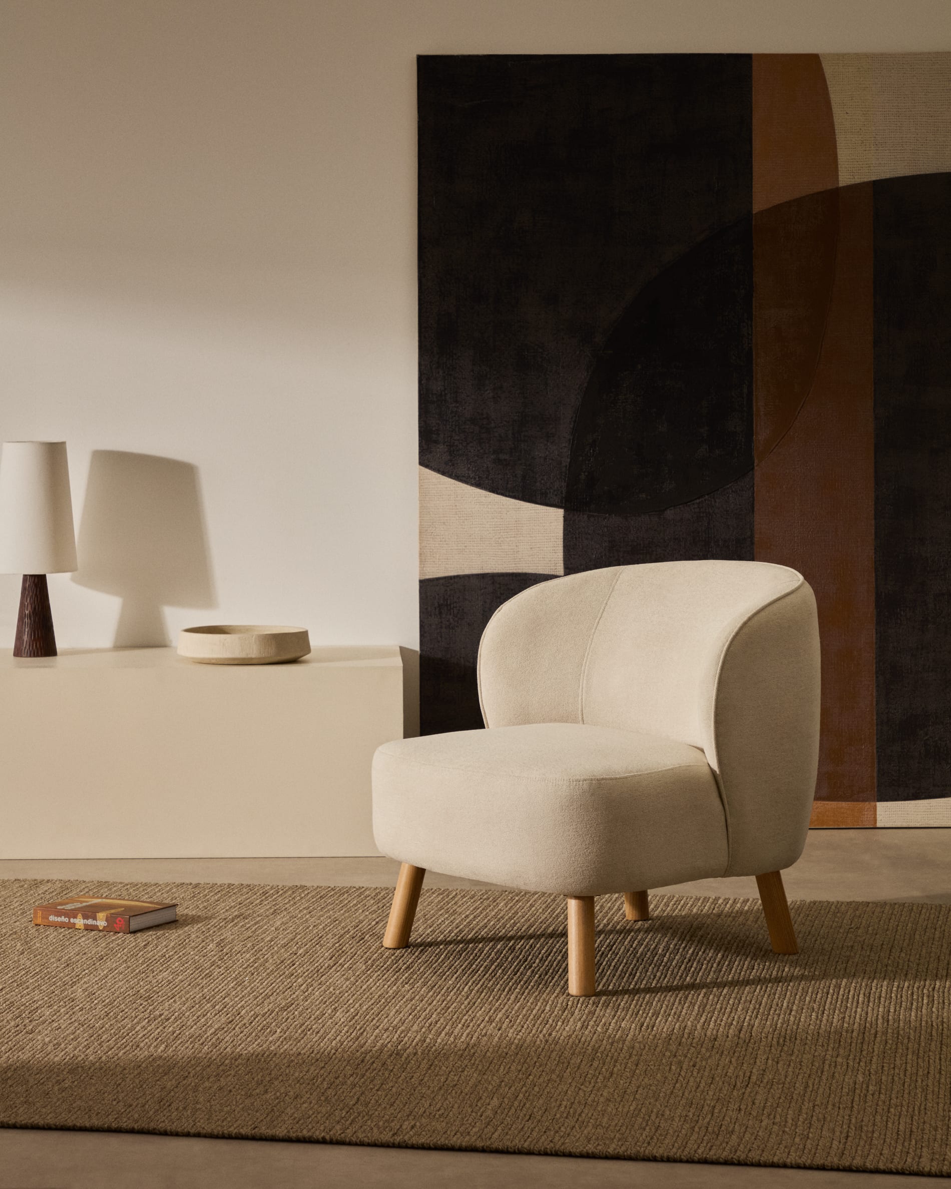 Ulit armchair in beige chenille with solid ash wood legs in a natural finish