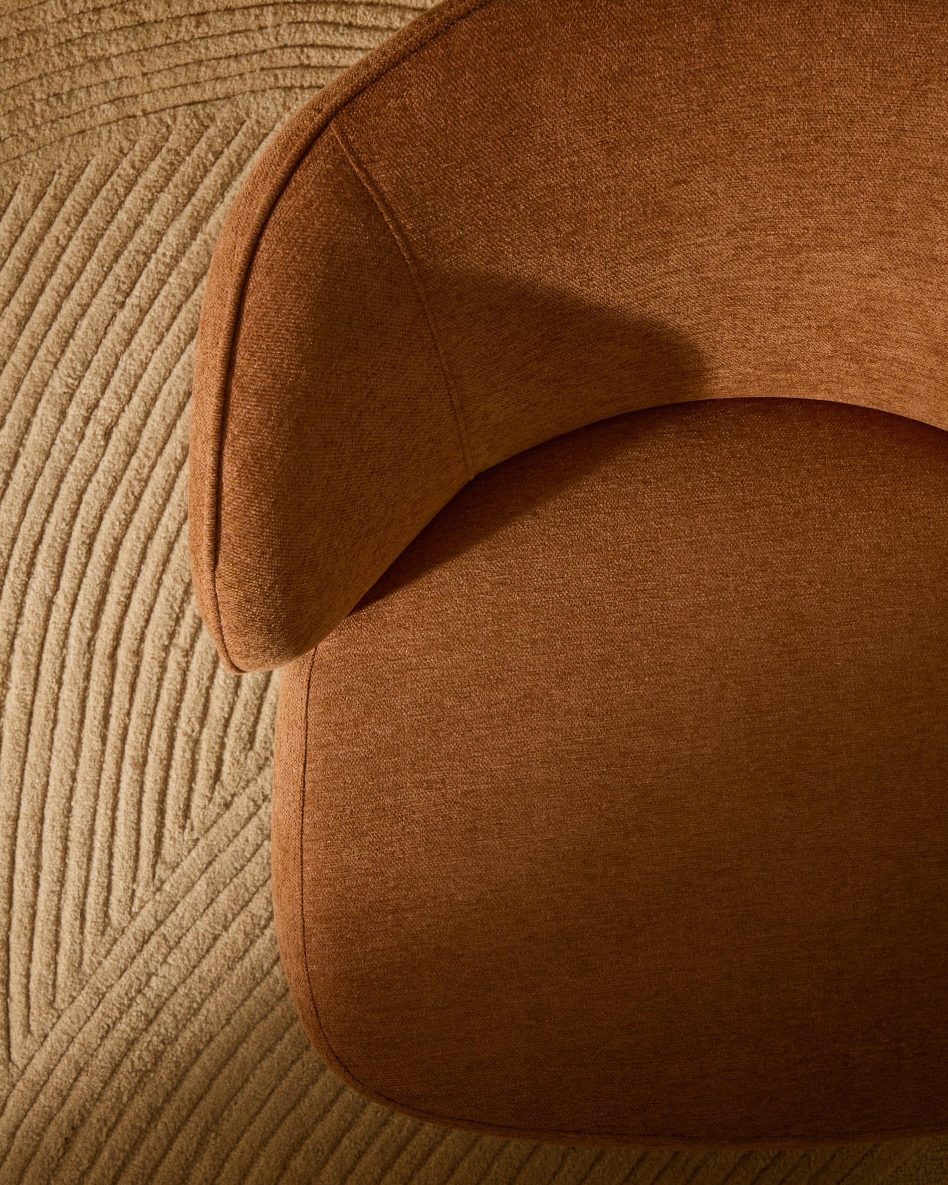 Ulit armchair in terracotta chenille with solid ash wood legs in a natural finish