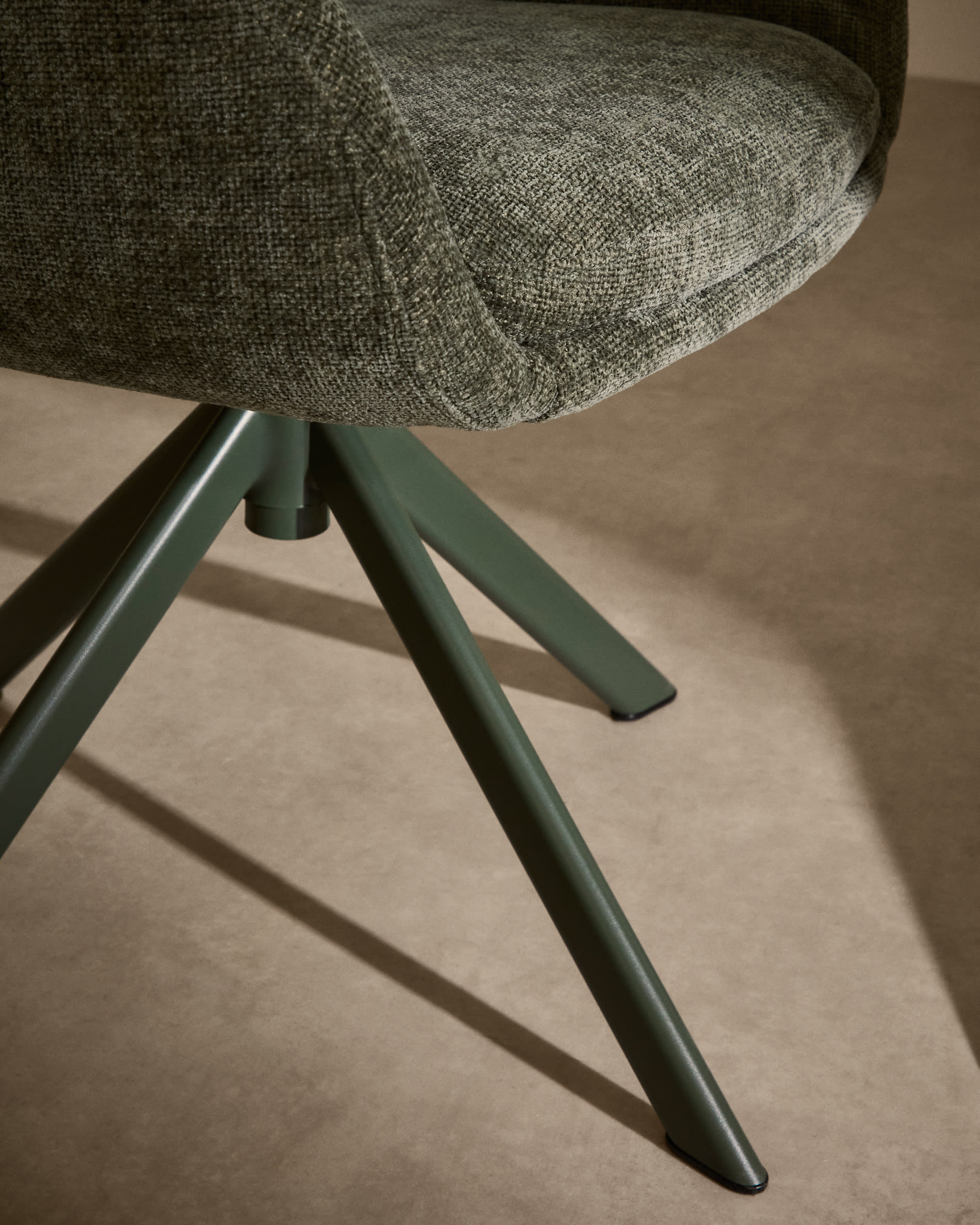 Lexa swivel chair in green chenille and steel legs in a green finish