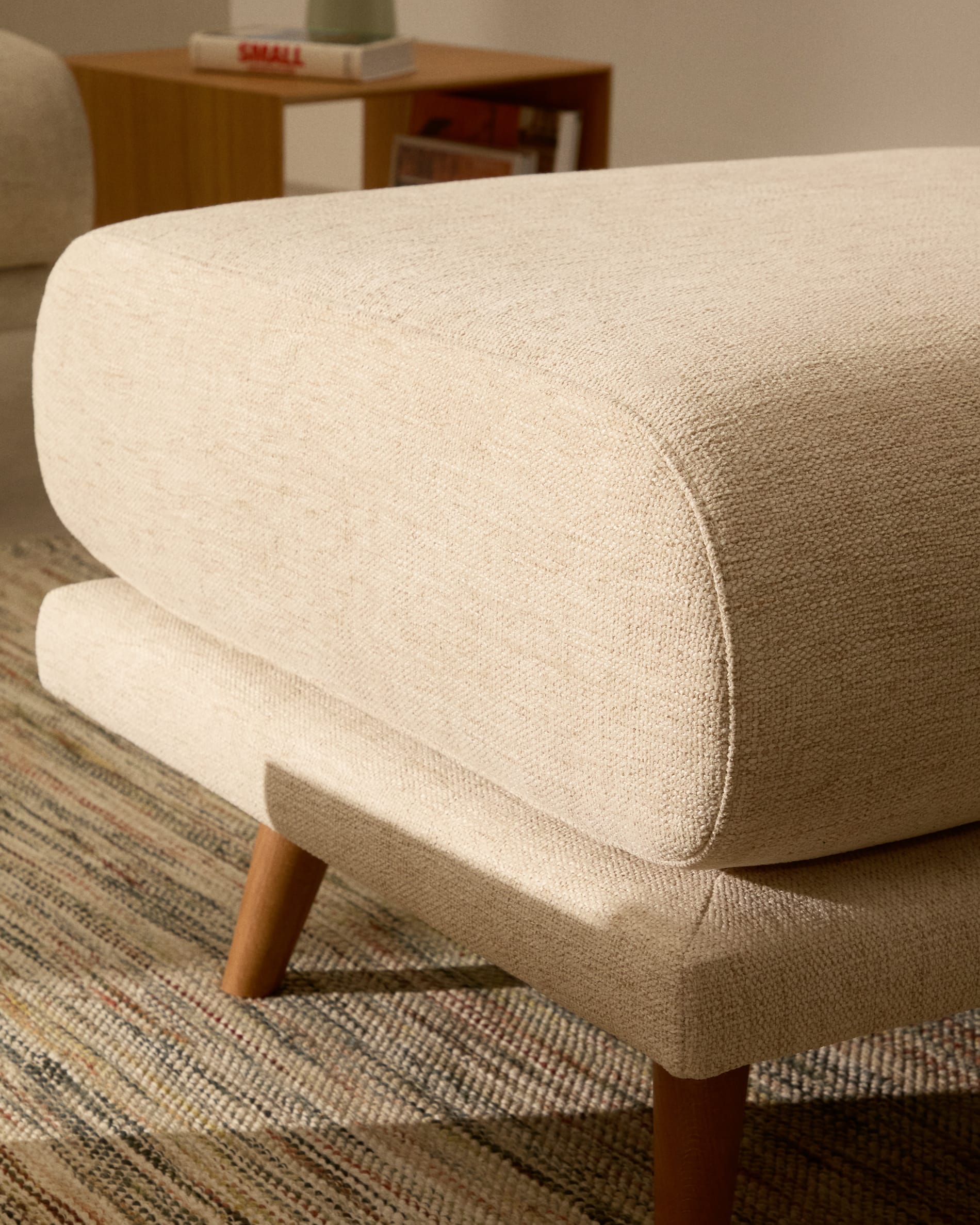 Karin footrest in beige chenille with solid beech wood legs in natural colour finish 90 x 70 cm