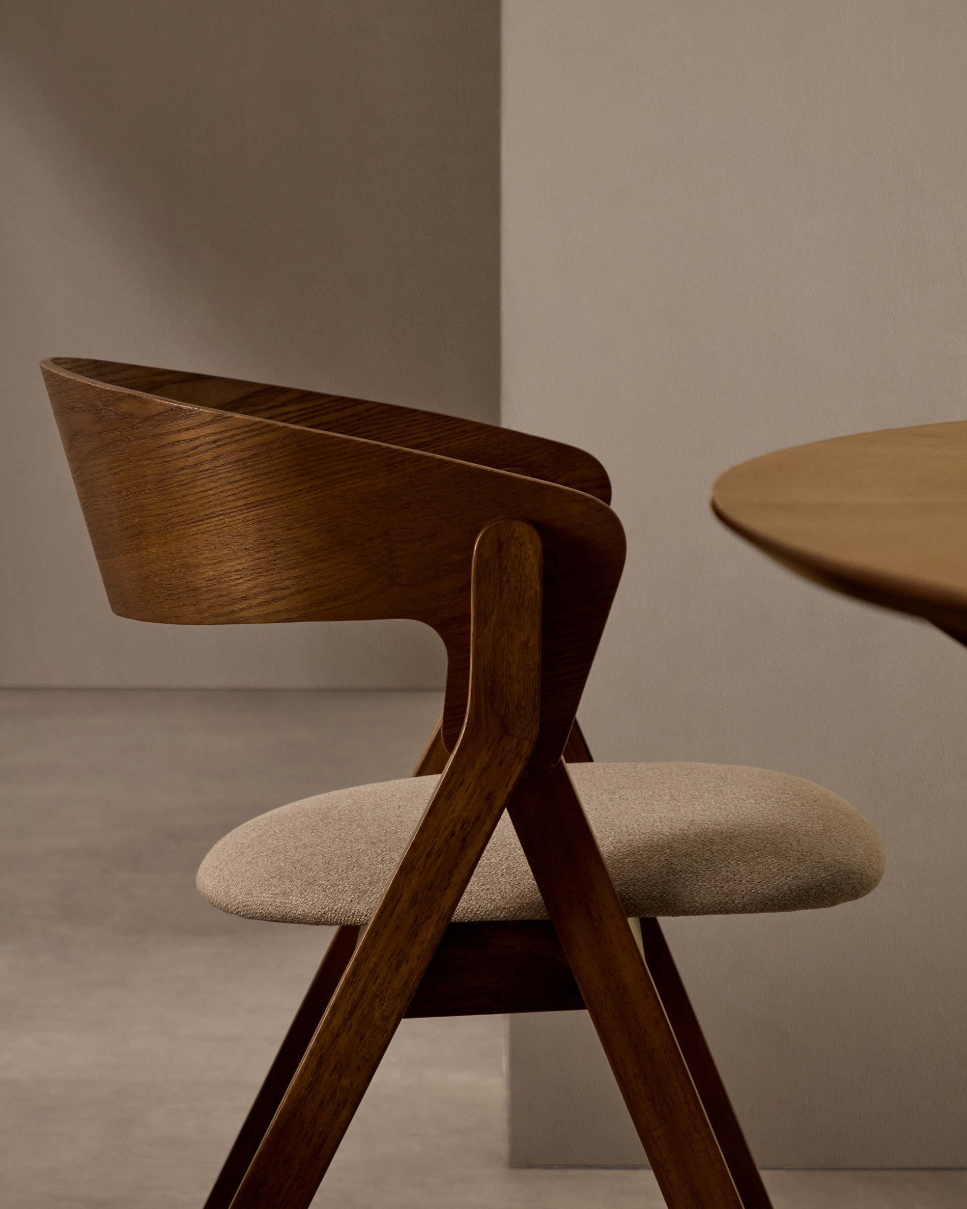 Godia chair in ash veneer with a wenge finish and beige chenille