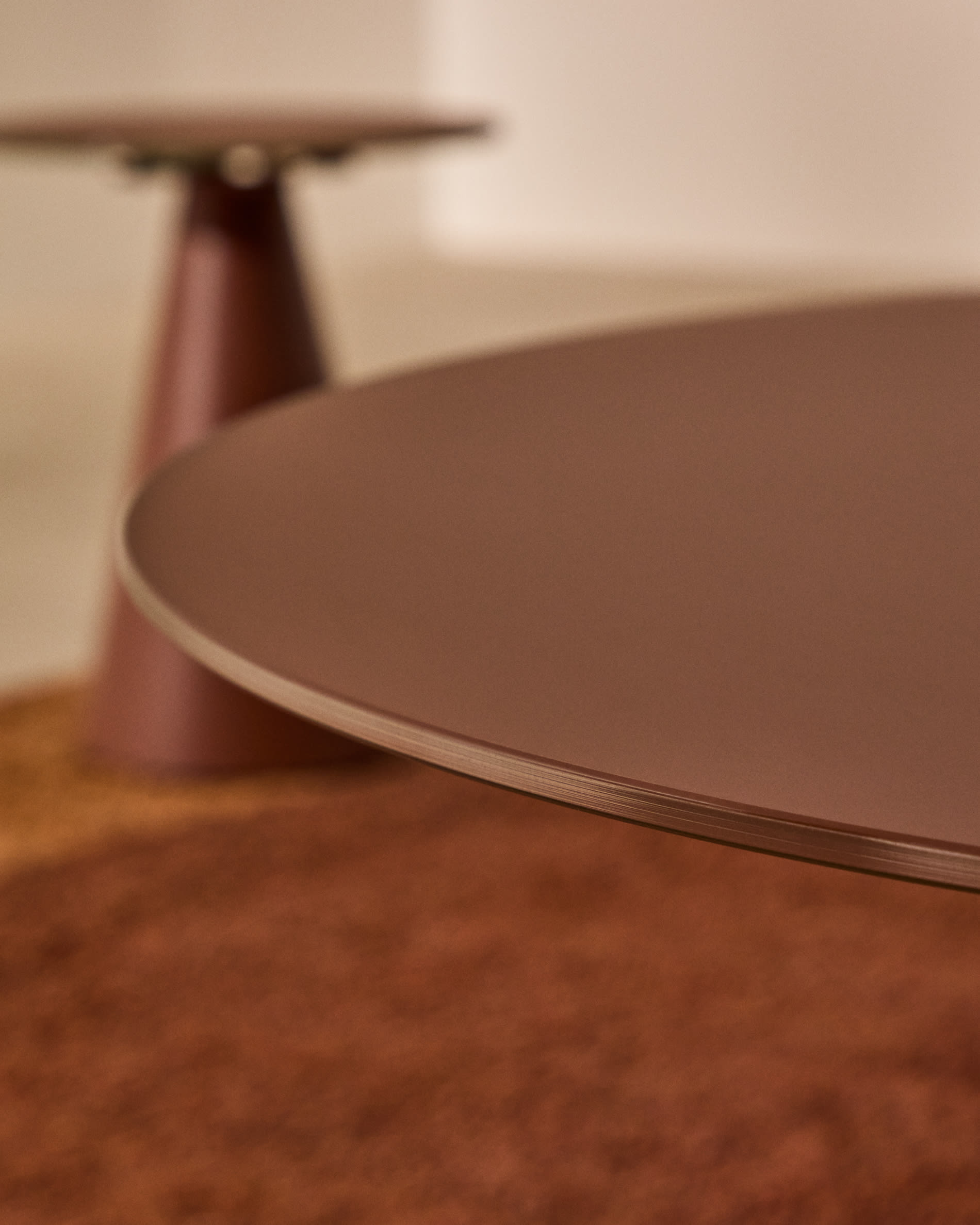 Wilshire coffee table with frosted tempered glass and matt terracotta painted steel finish Ø80cm