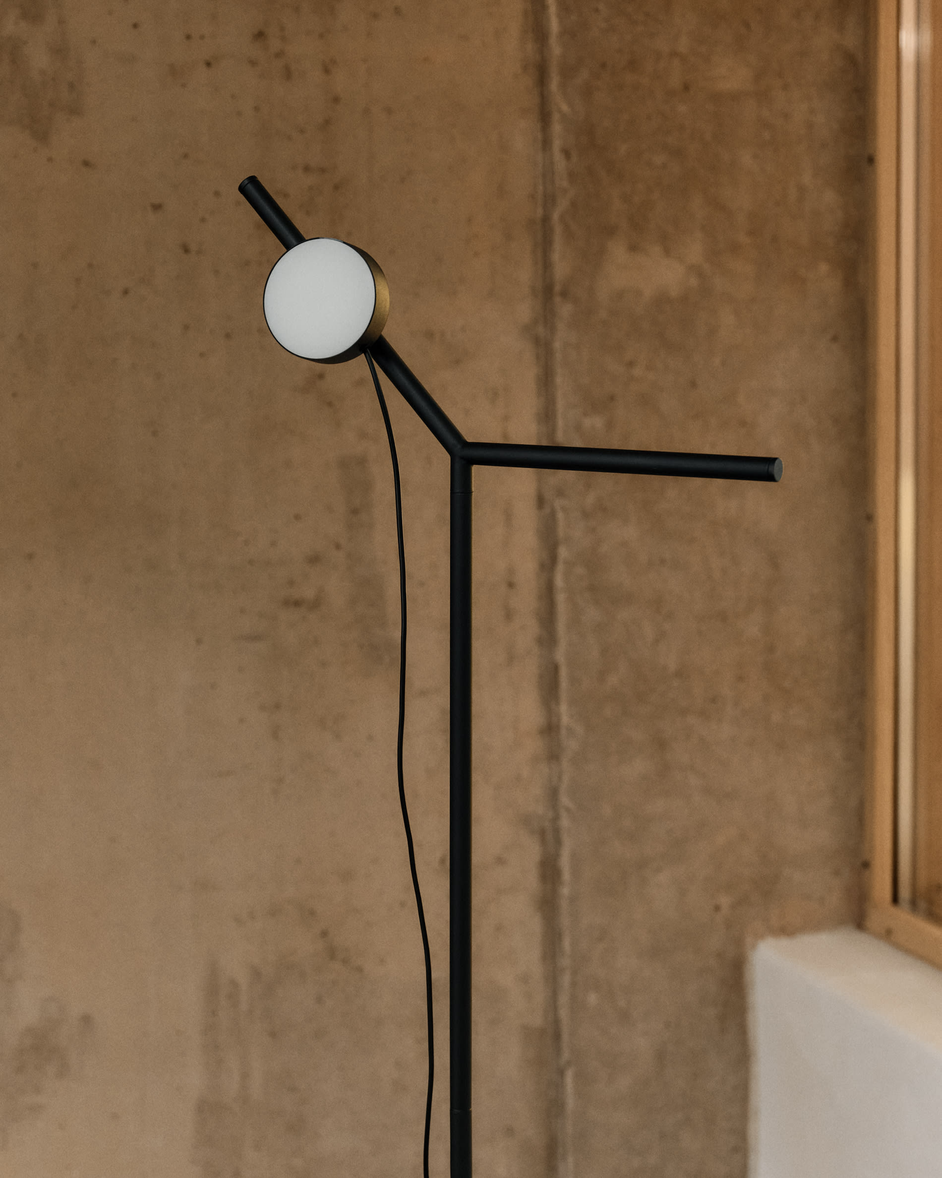 Orey black metal floor lamp with multi-position spotlight