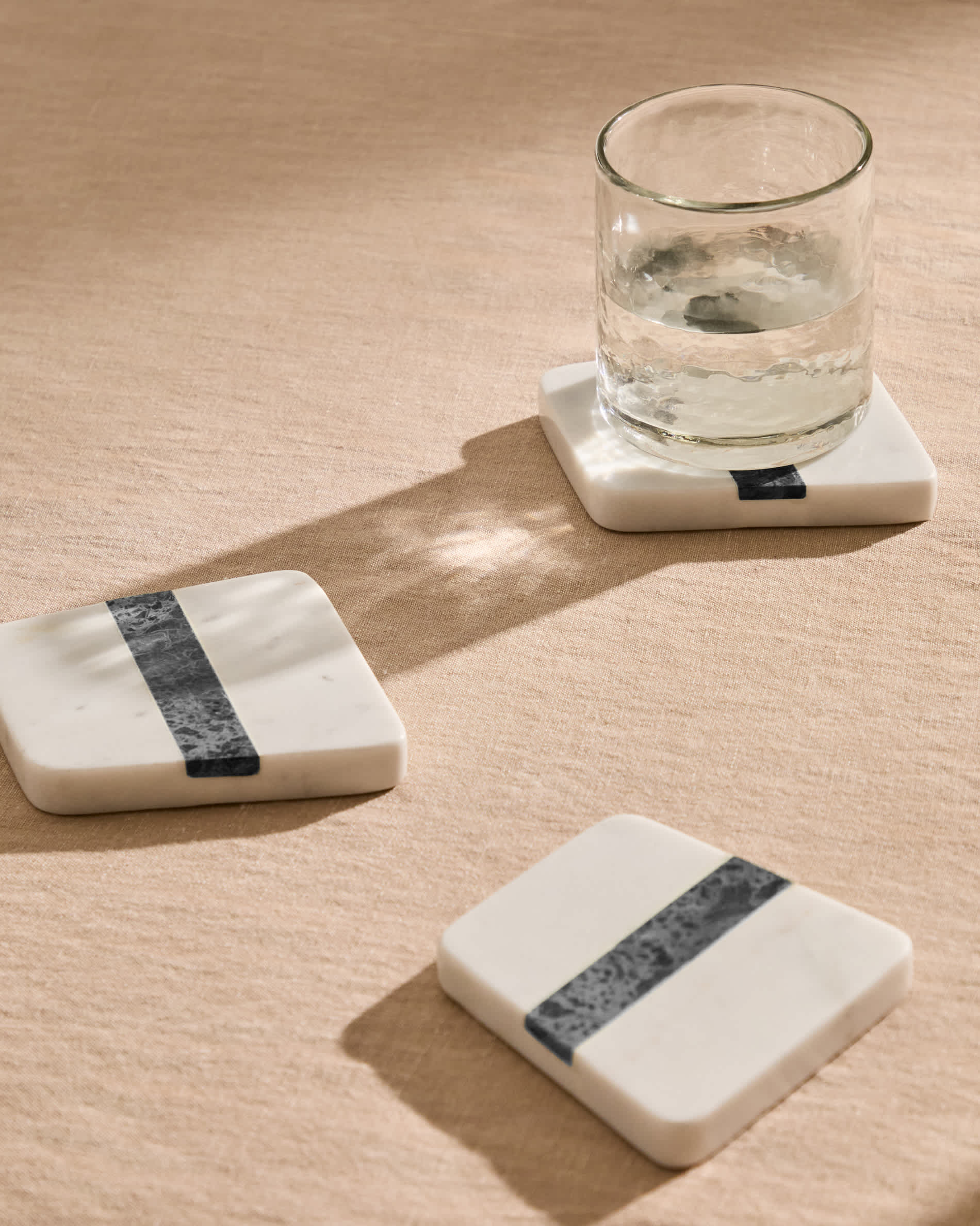 Nira set of 4 white and grey marble coasters