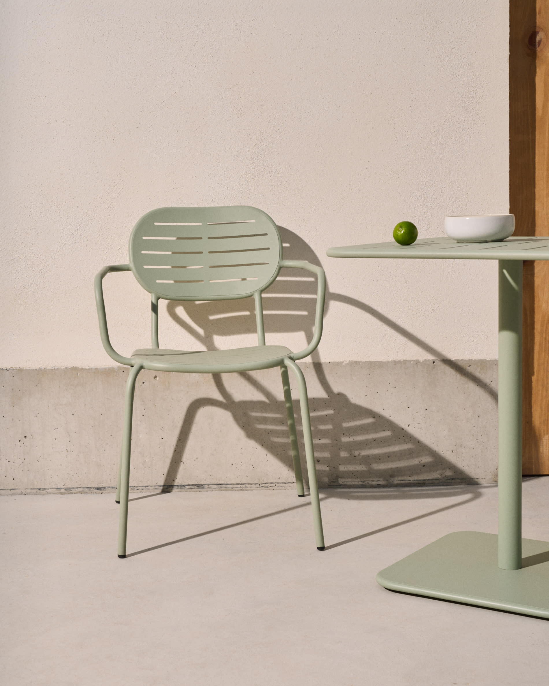 Brai stackable outdoor chair with armrests in turquoise galvanised steel