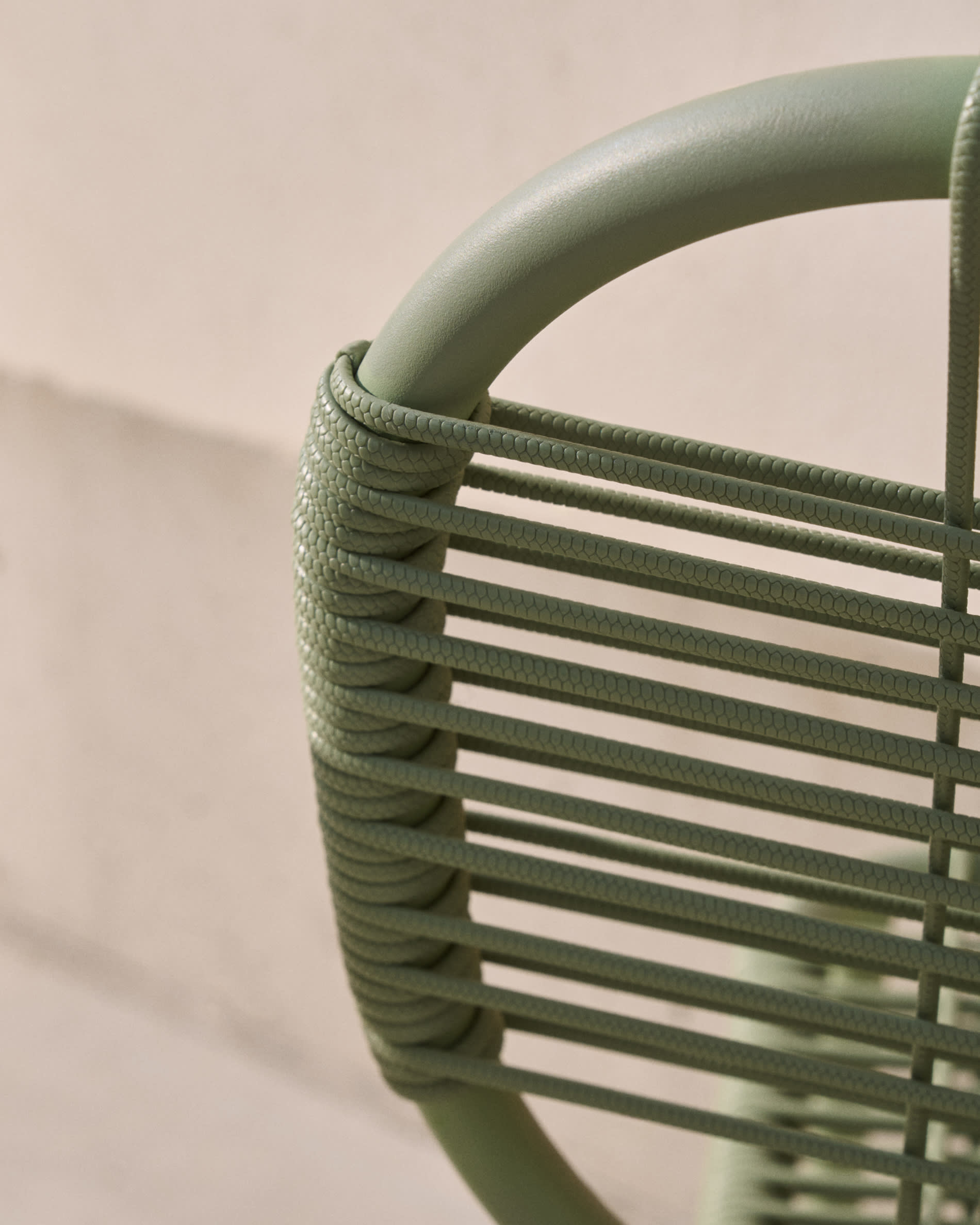 Talaier stackable outdoor chair in synthetic rope and galvanised steel with turquoise finish