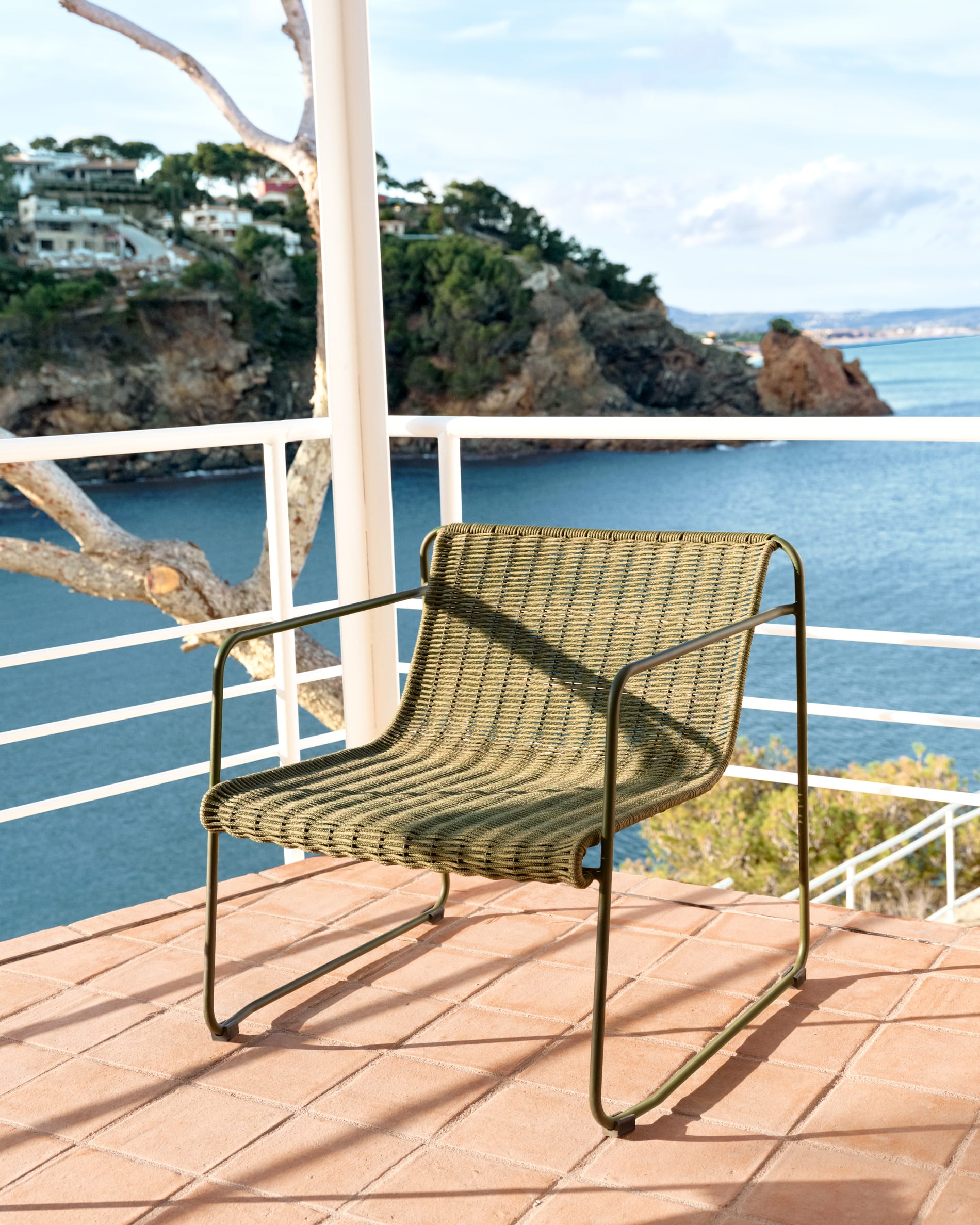 Maurina stackable armchair in green galvanised steel and green rope cord