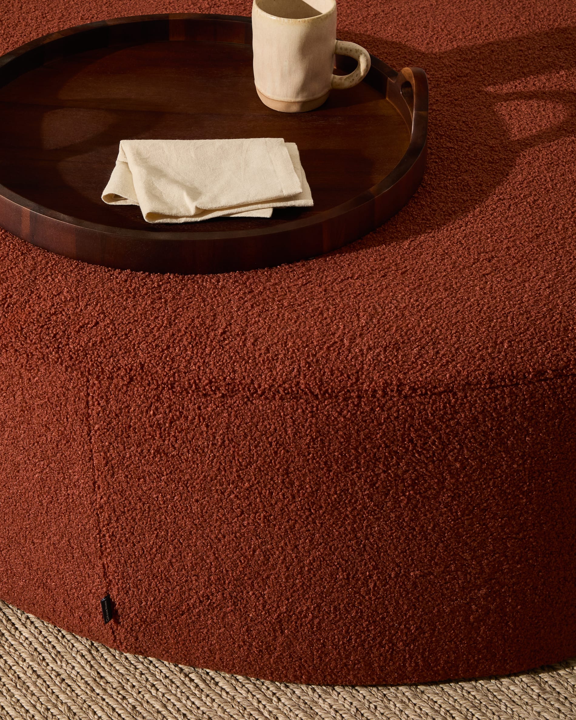 Kaeli footrest cover in terracotta bouclé Ø 120 cm