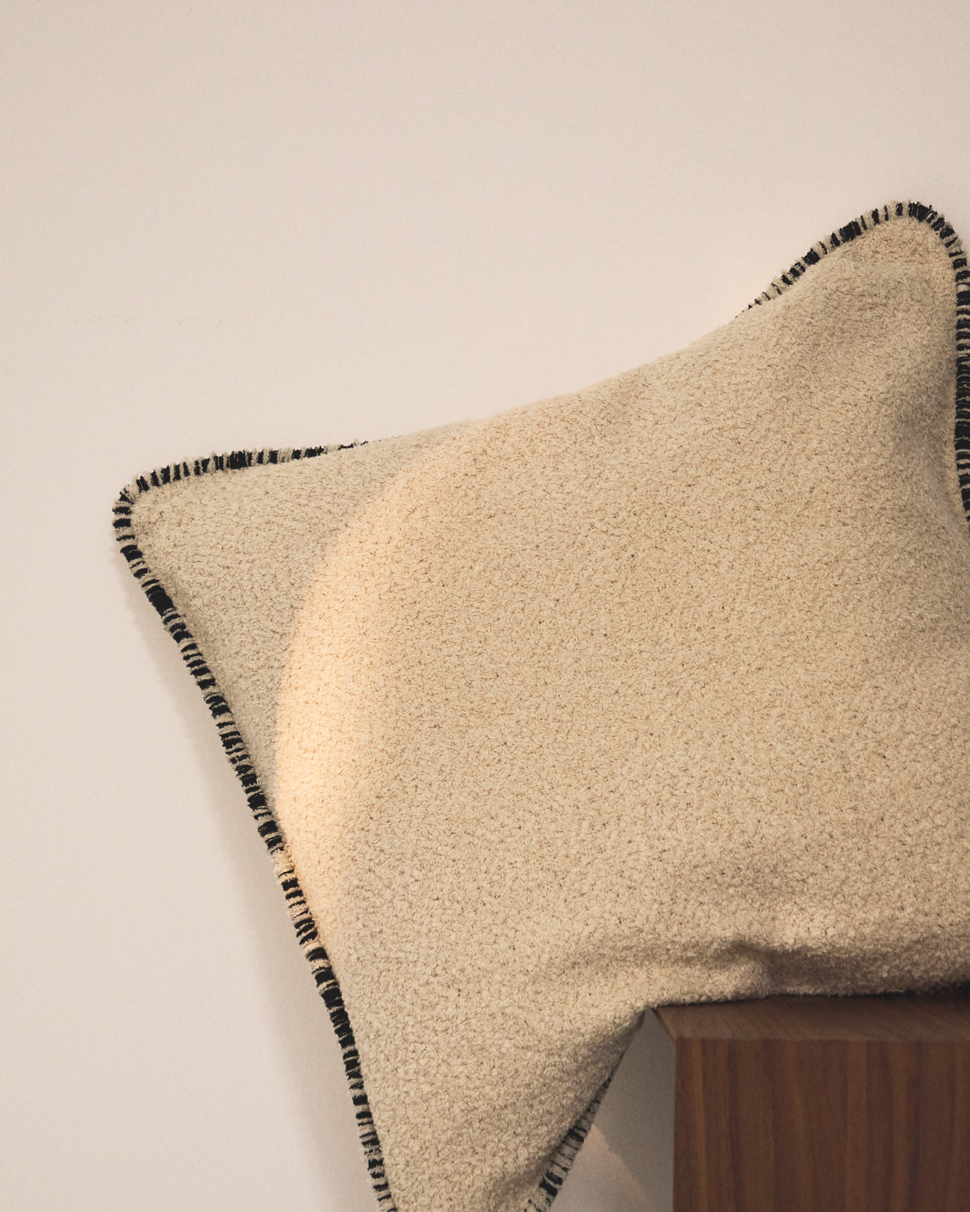 Enari beige 100% cotton cushion cover with contrasting black trim 50 x 50cm