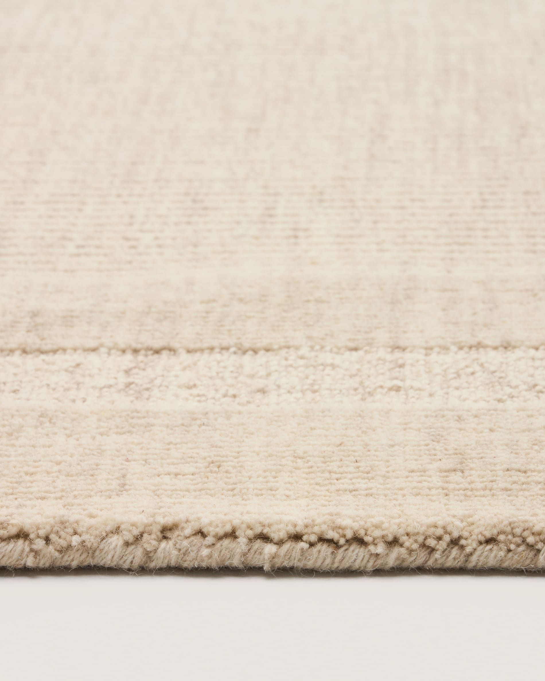 Dalena beige striped jacquard wool rug 300 x 200cm