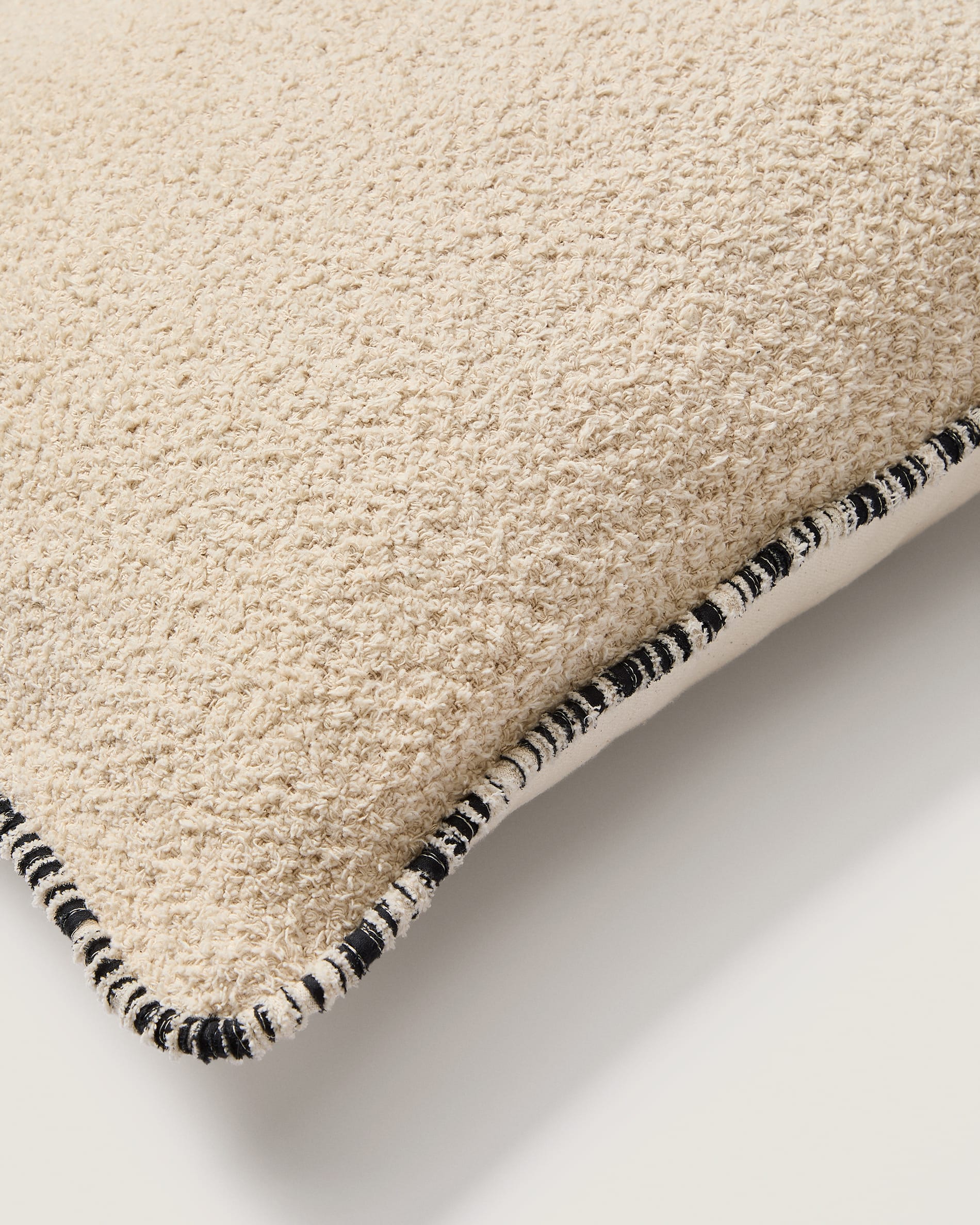 Enari beige 100% cotton cushion cover with contrasting black trim 50 x 50cm