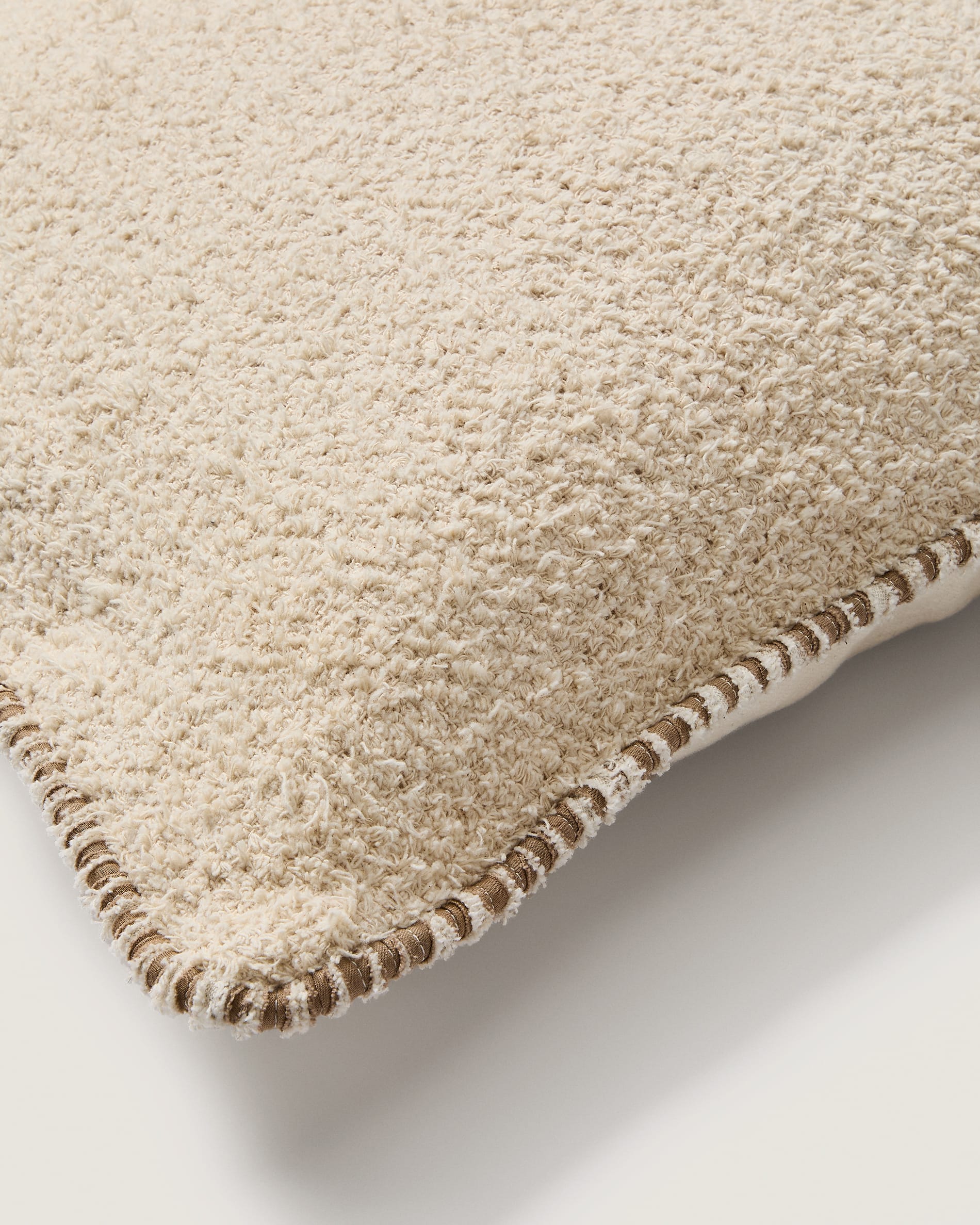Enari beige cotton cushion cover with contrasting brown trim 50 x 50cm