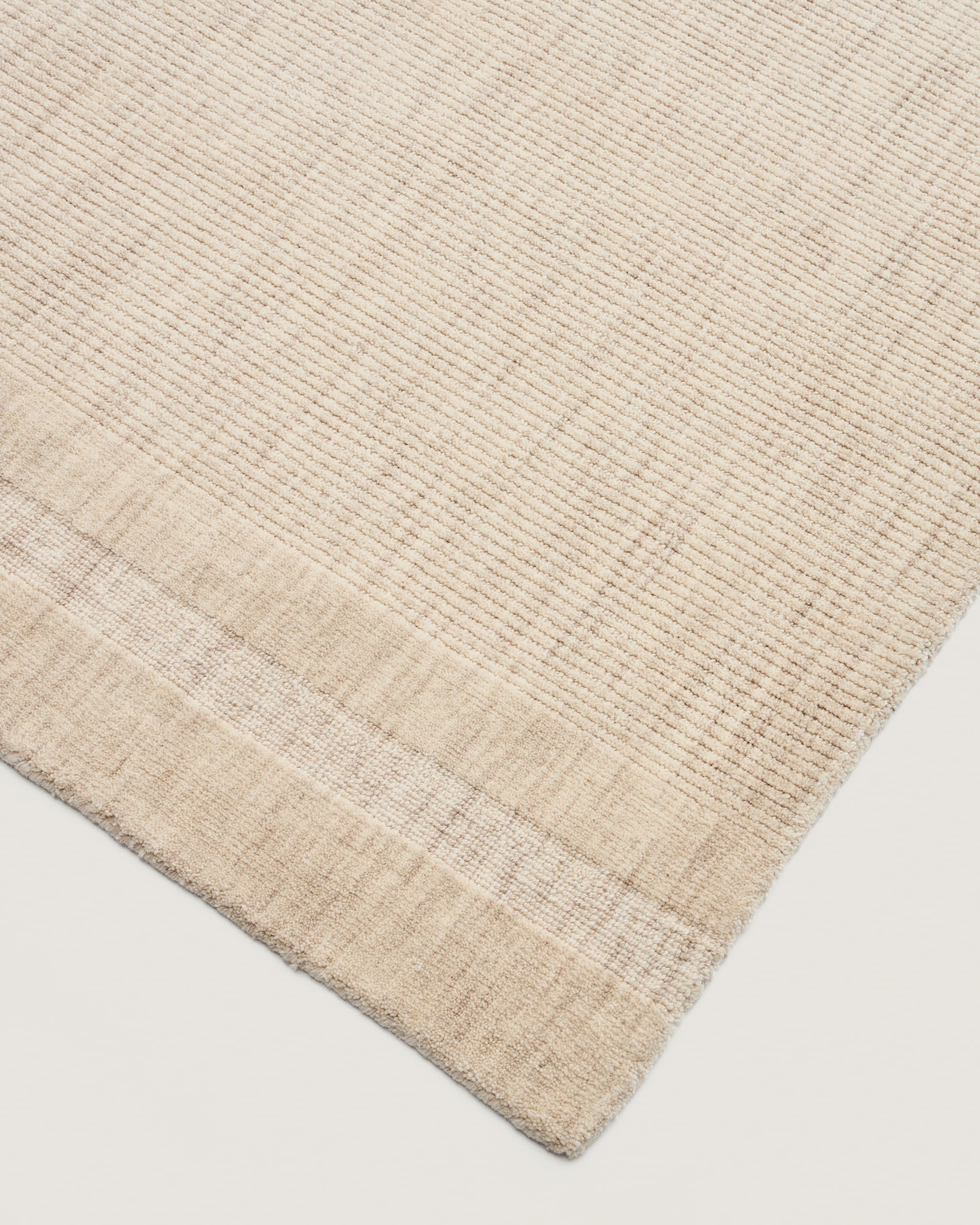 Dalena beige striped jacquard wool rug 300 x 200cm