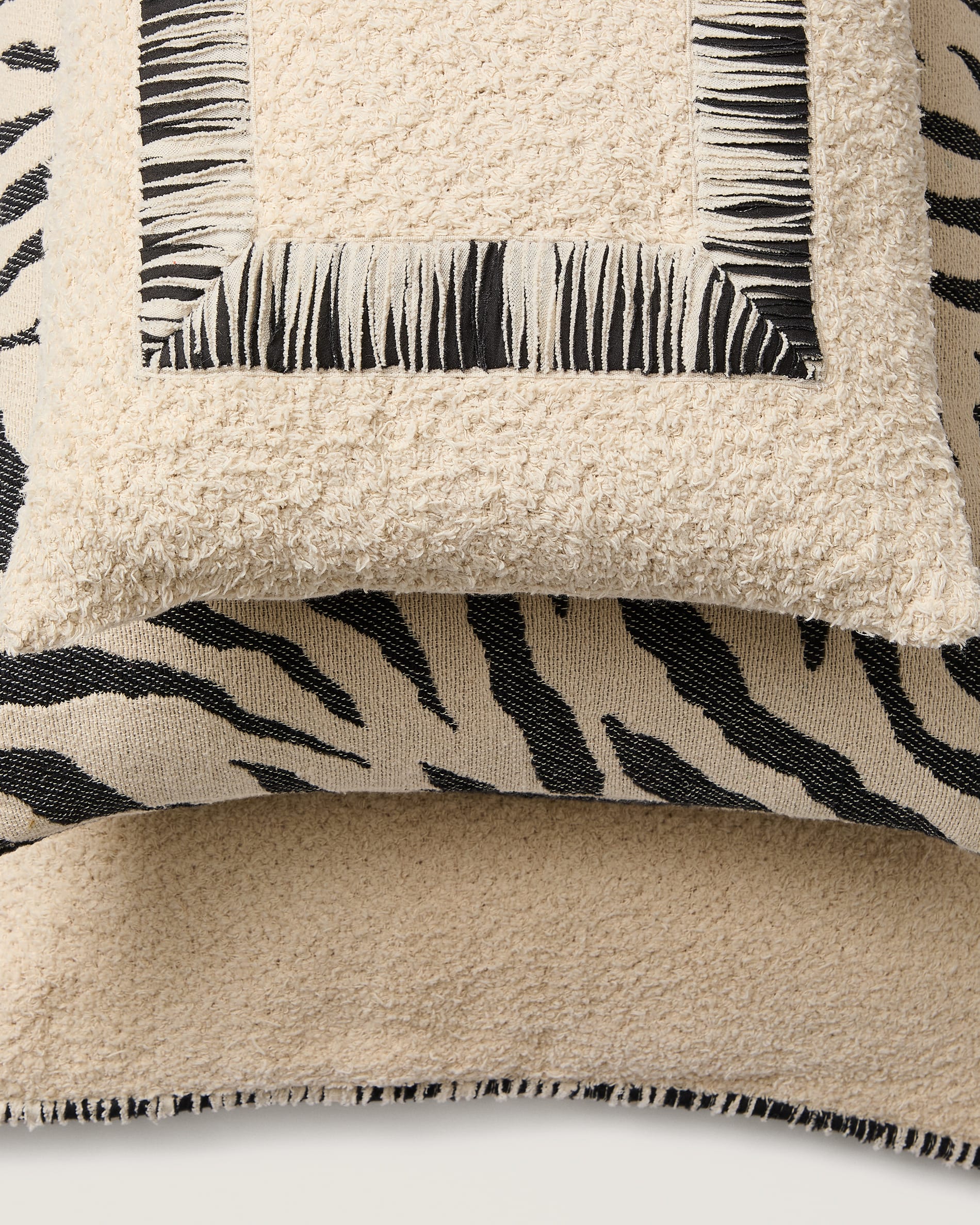 Enari beige 100% cotton cushion cover with contrasting black trim 50 x 50cm