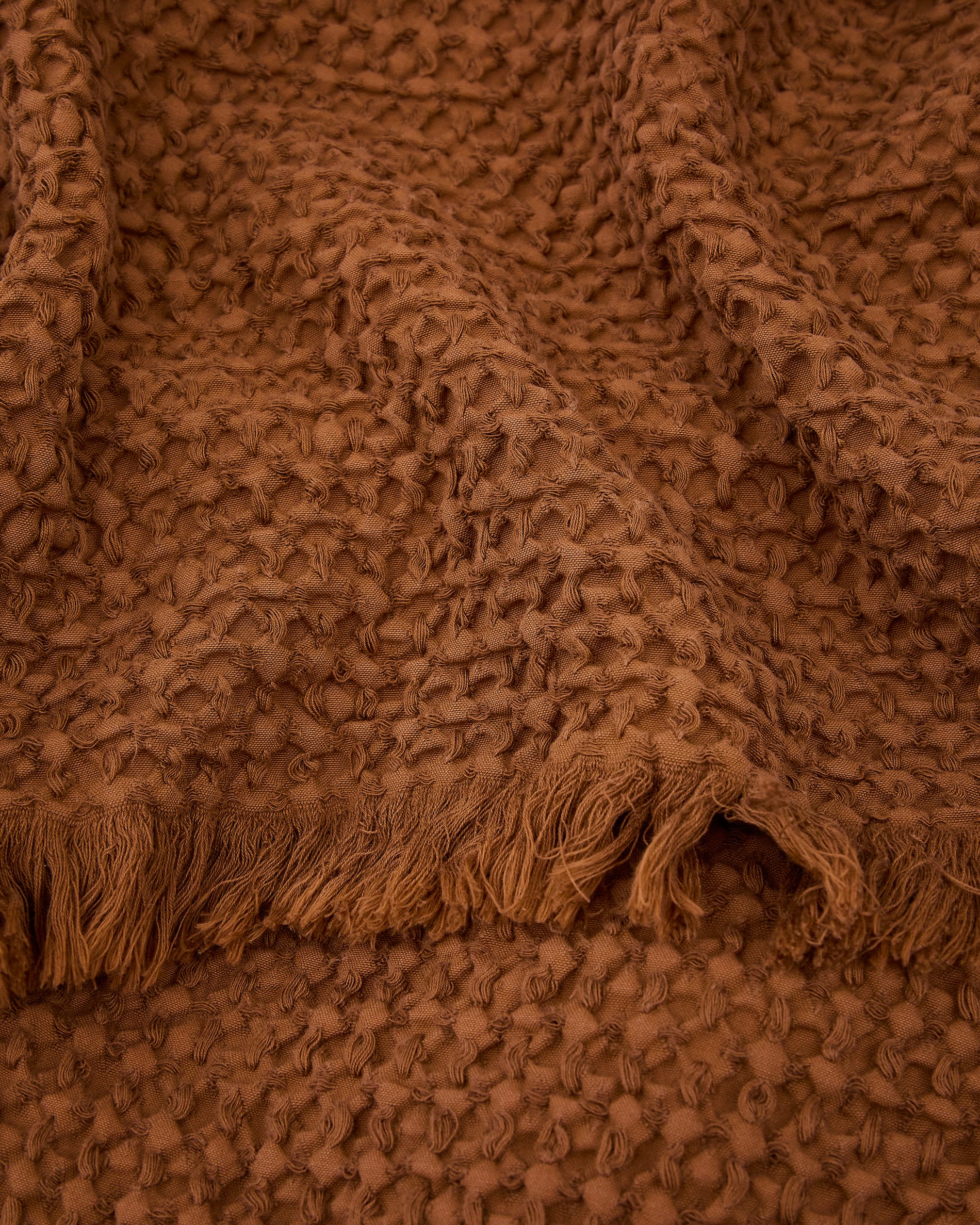 Nulina 100% cotton waffle blanket in dark orange 130 x 170 cm