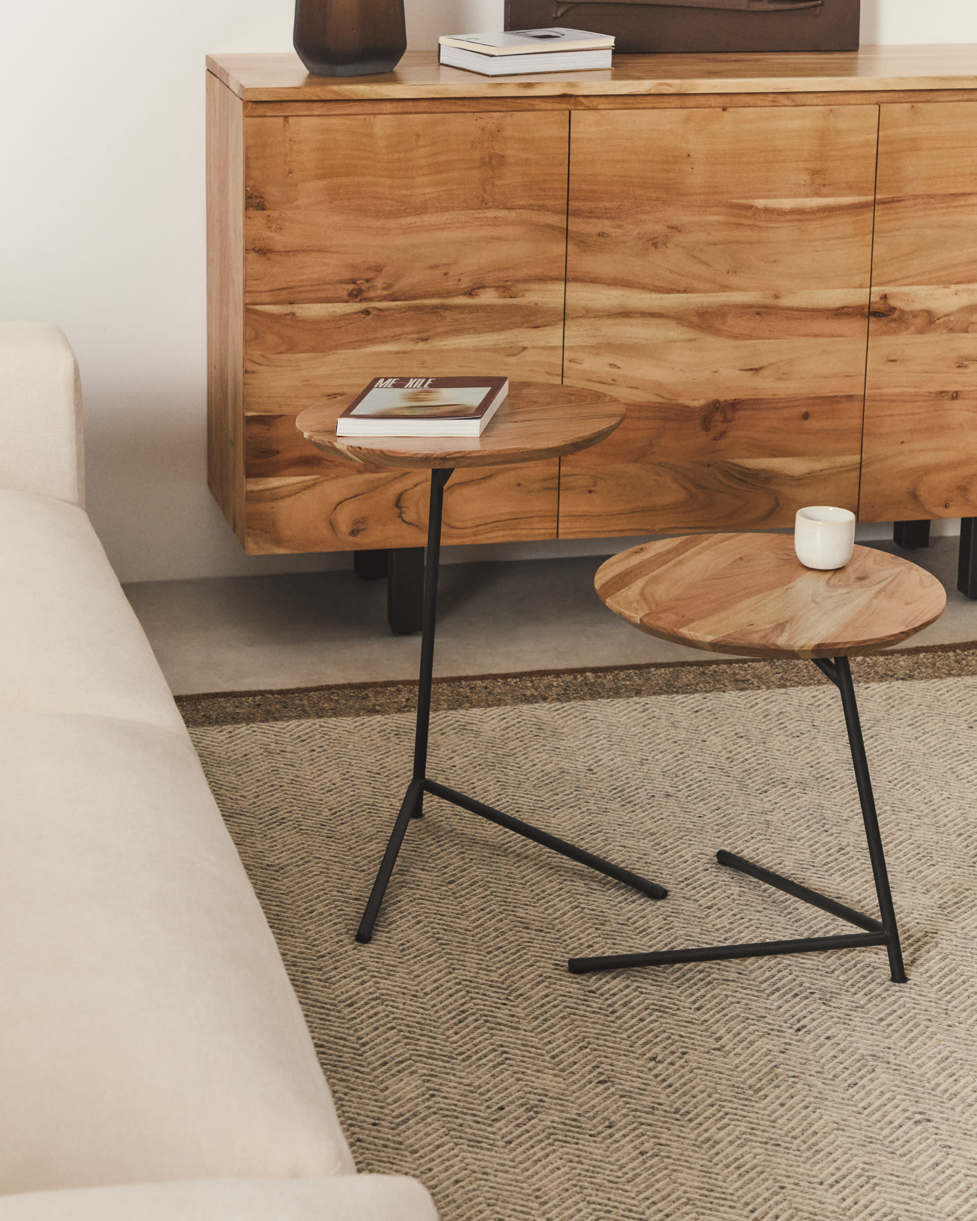 Vintara set of 2 nesting side tables in solid acacia wood with bleached finish and black steel legs Ø40cm