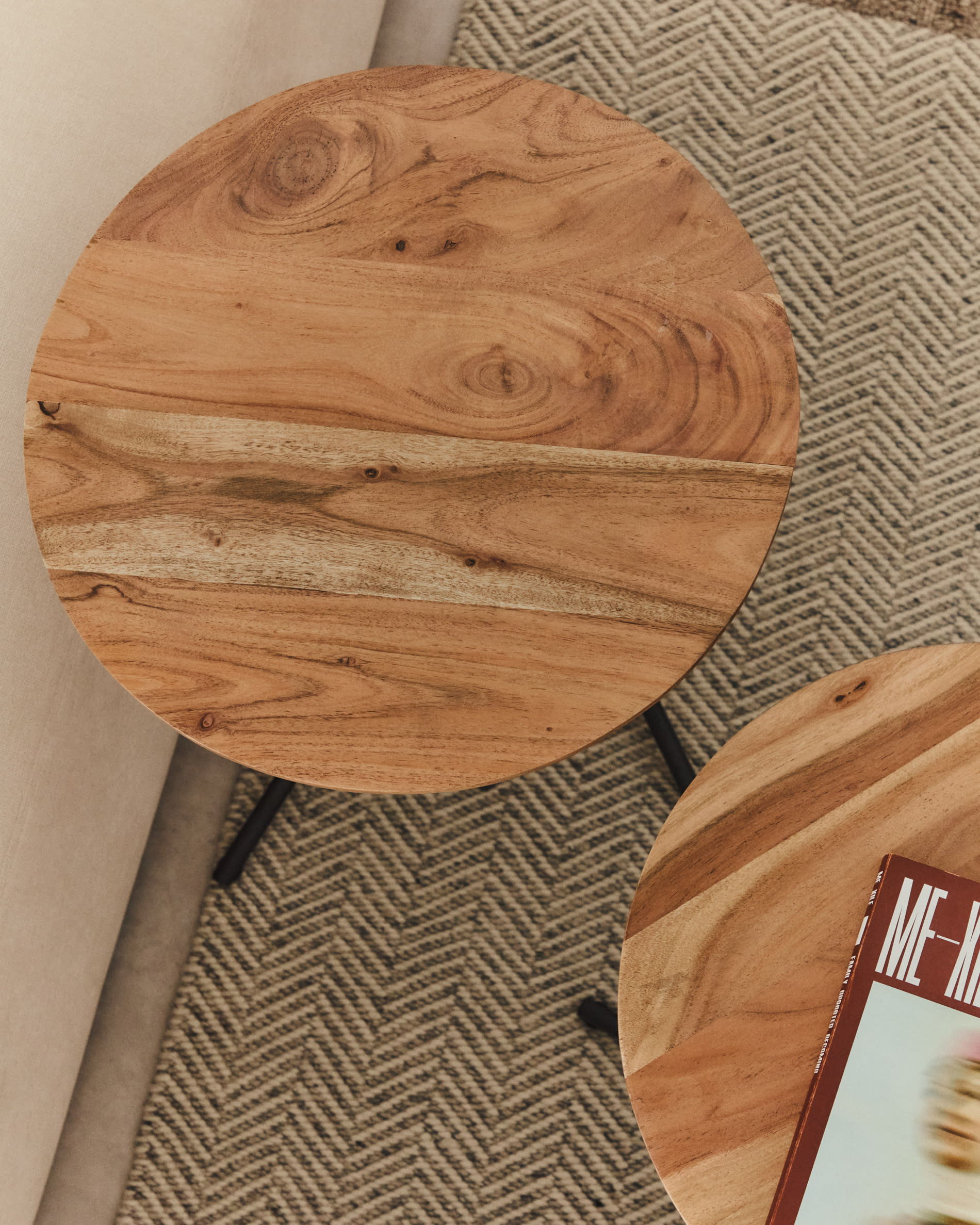 Vintara set of 2 nesting side tables in solid acacia wood with bleached finish and black steel legs Ø40cm