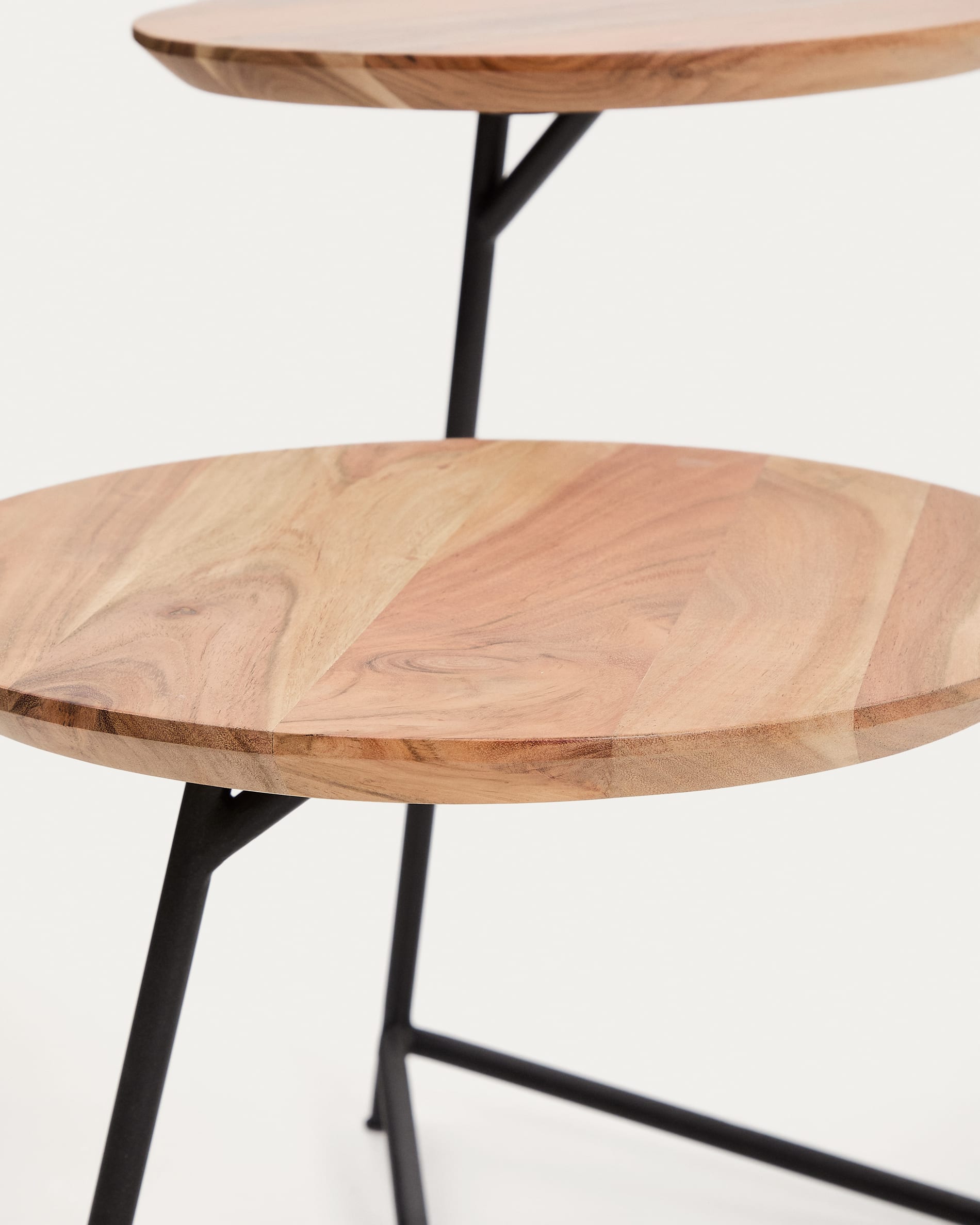 Vintara set of 2 nesting side tables in solid acacia wood with bleached finish and black steel legs Ø40cm