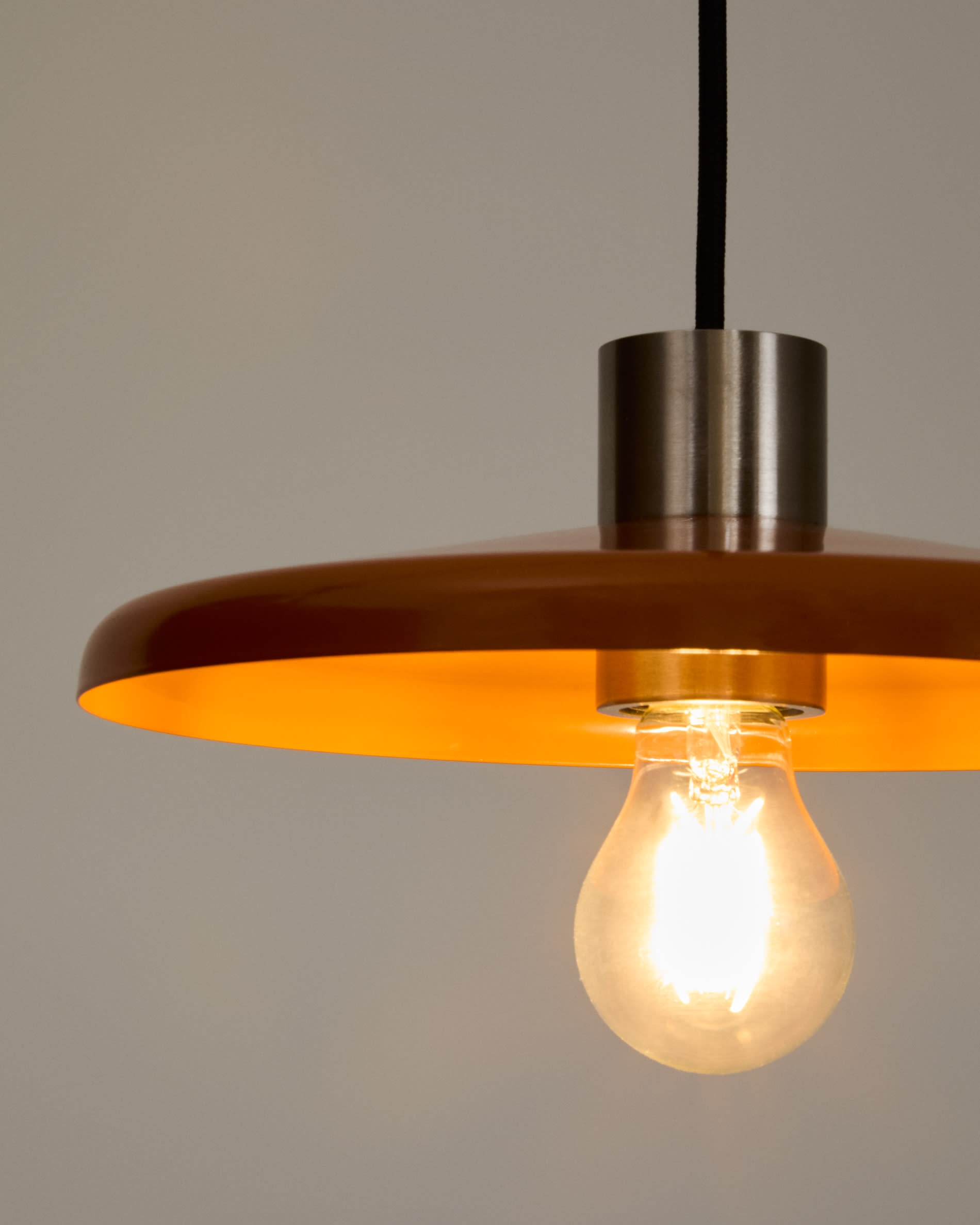 Nuvira ceiling lamp in light grey brushed metal with orange lampshade
